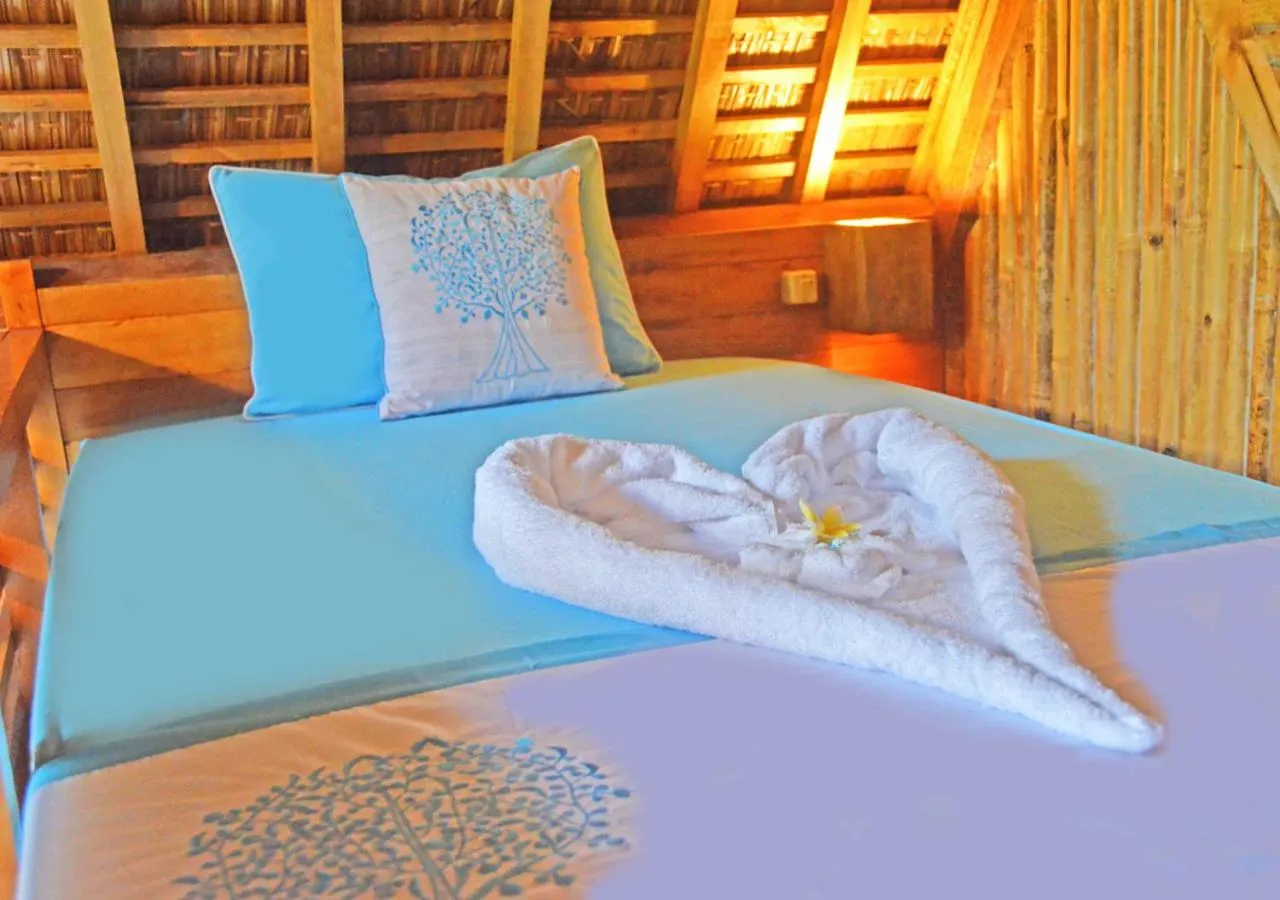 Bedroom, Bed in Lagoona Beach Bungalows - Eco Bungalows Batukaras
