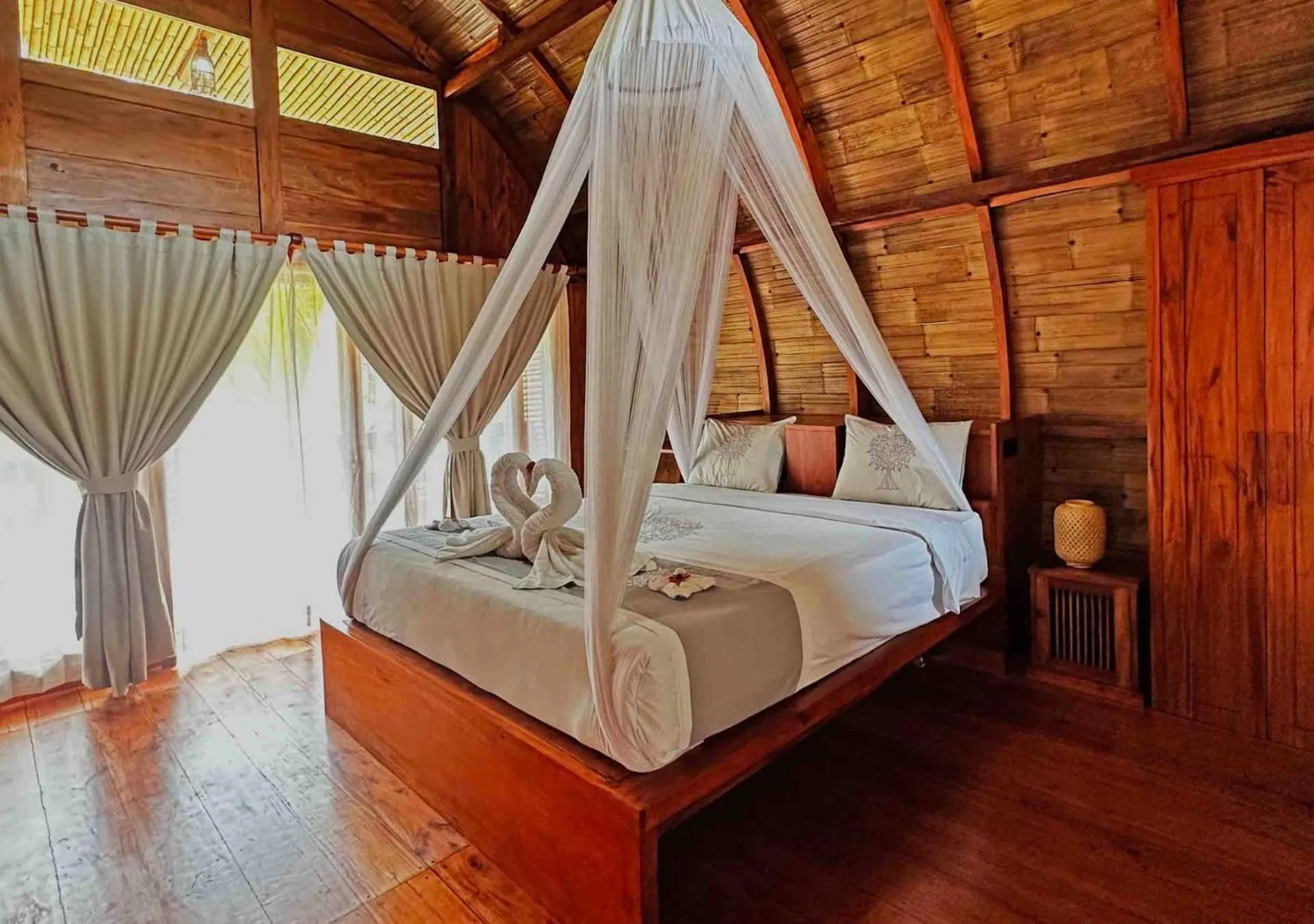 Bed in Lagoona Beach Bungalows - Eco Bungalows Batukaras