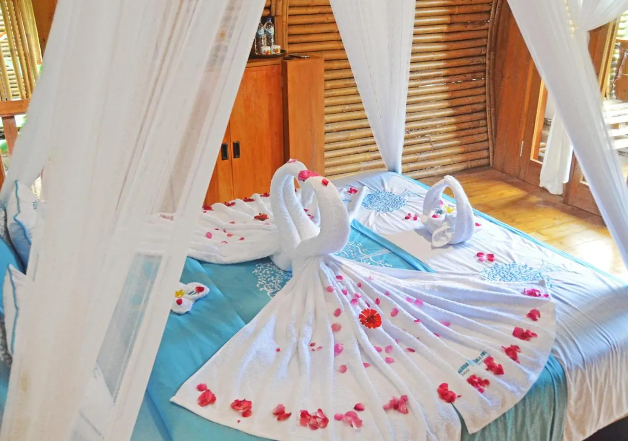 Bedroom, Bed in Lagoona Beach Bungalows - Eco Bungalows Batukaras