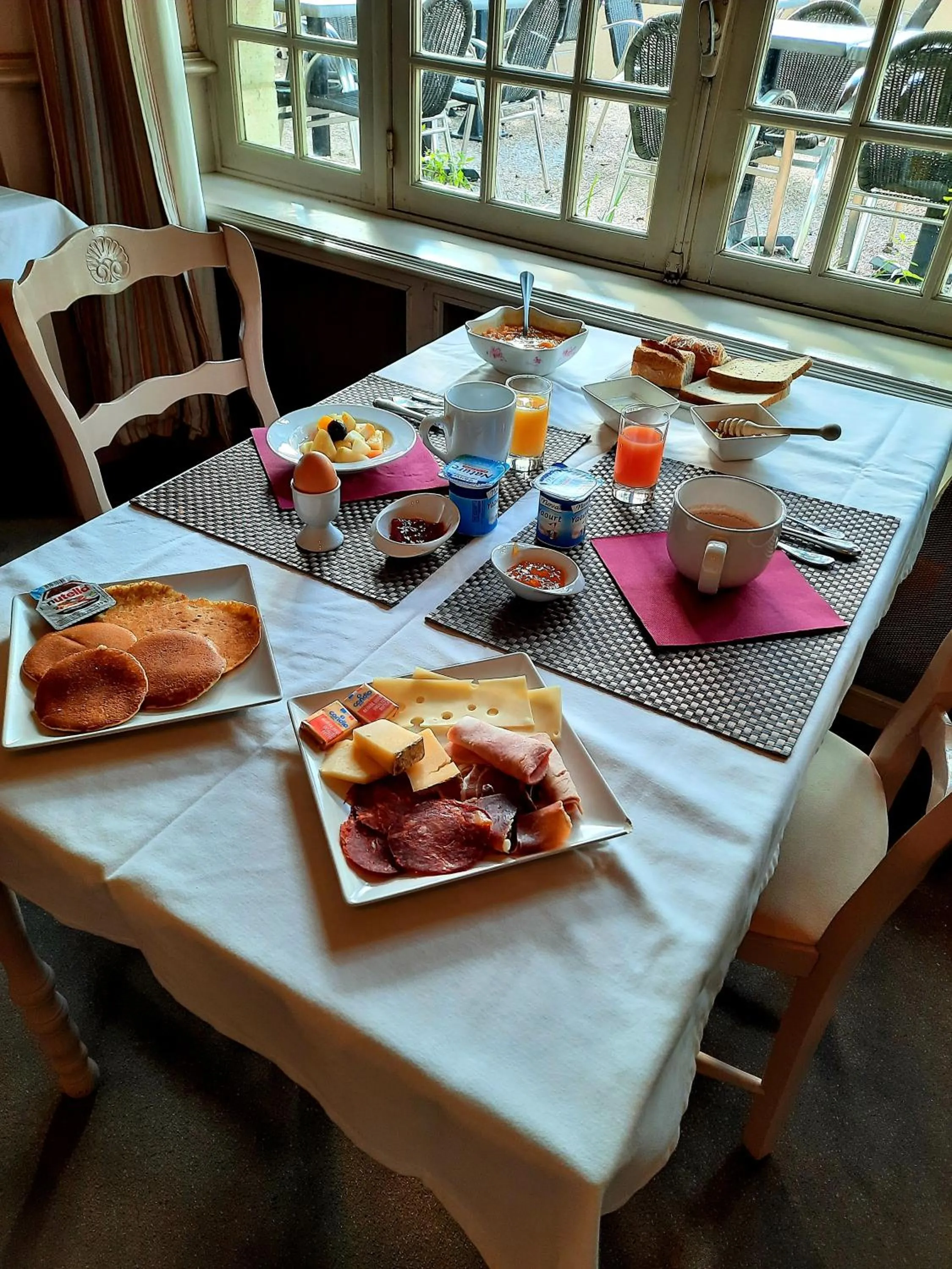 Continental breakfast in Logis Hôtels - Hôtel et Restaurant Le Lion d'Or