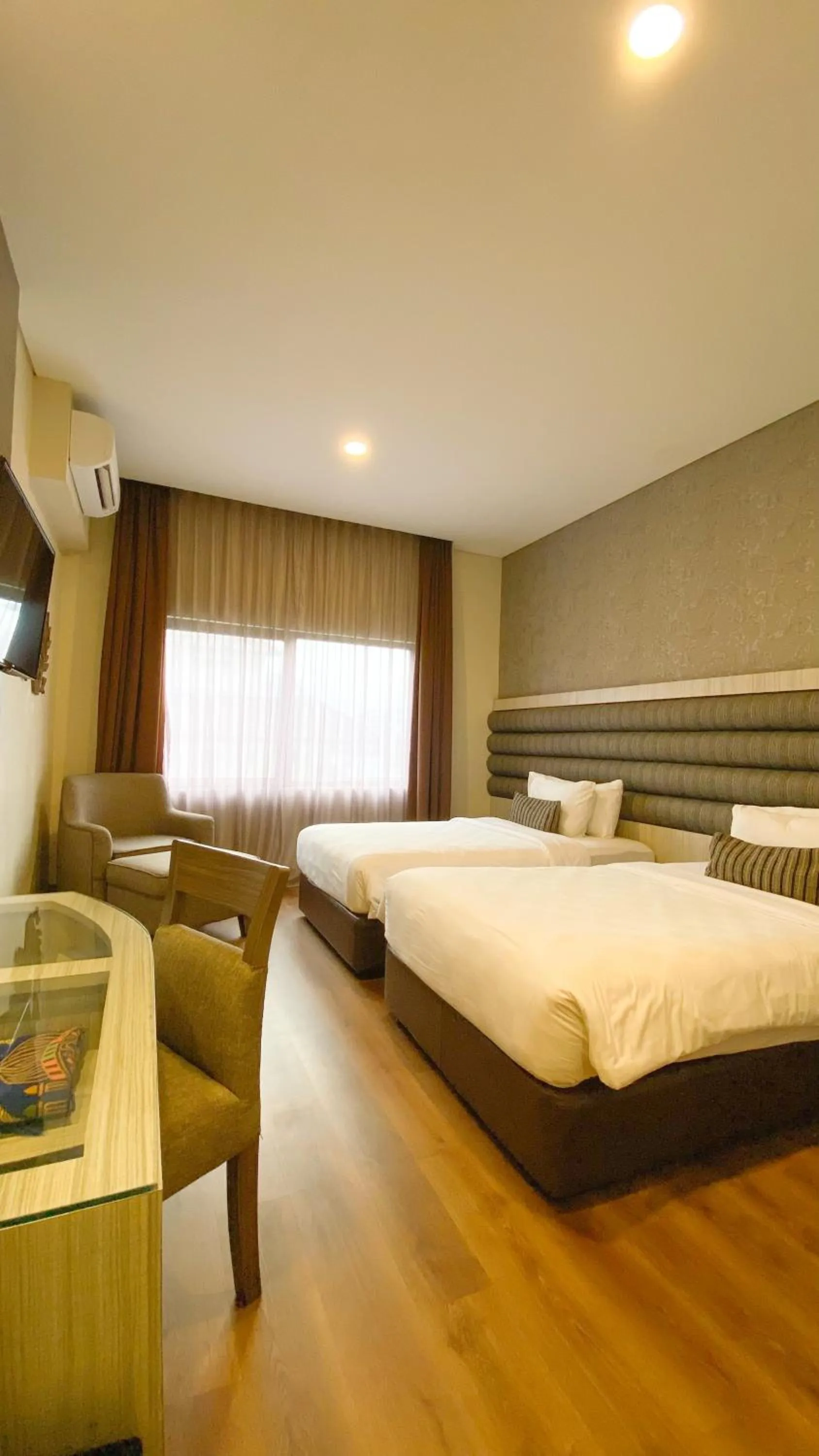 Bed in Hotel Gren Alia Jakarta