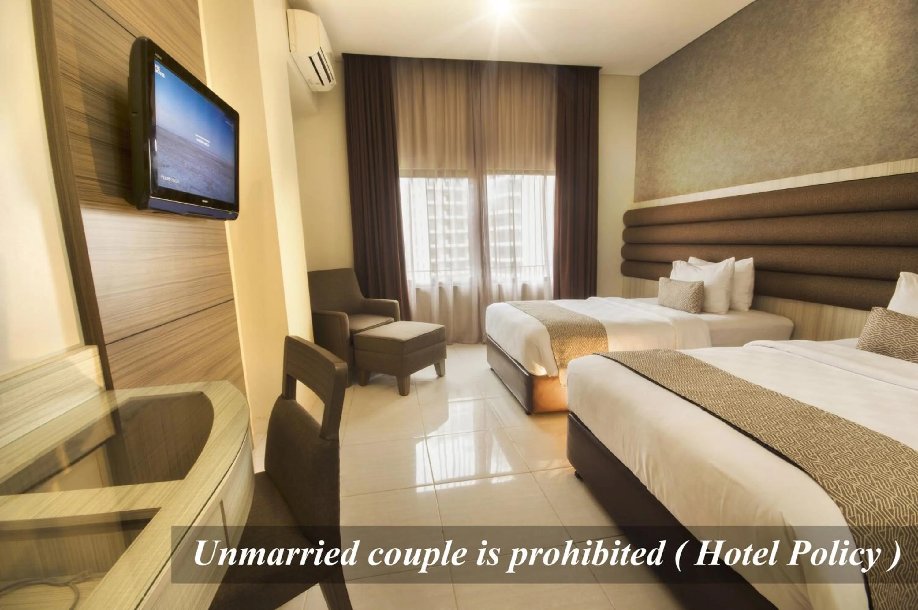 Bed in Hotel Gren Alia Jakarta