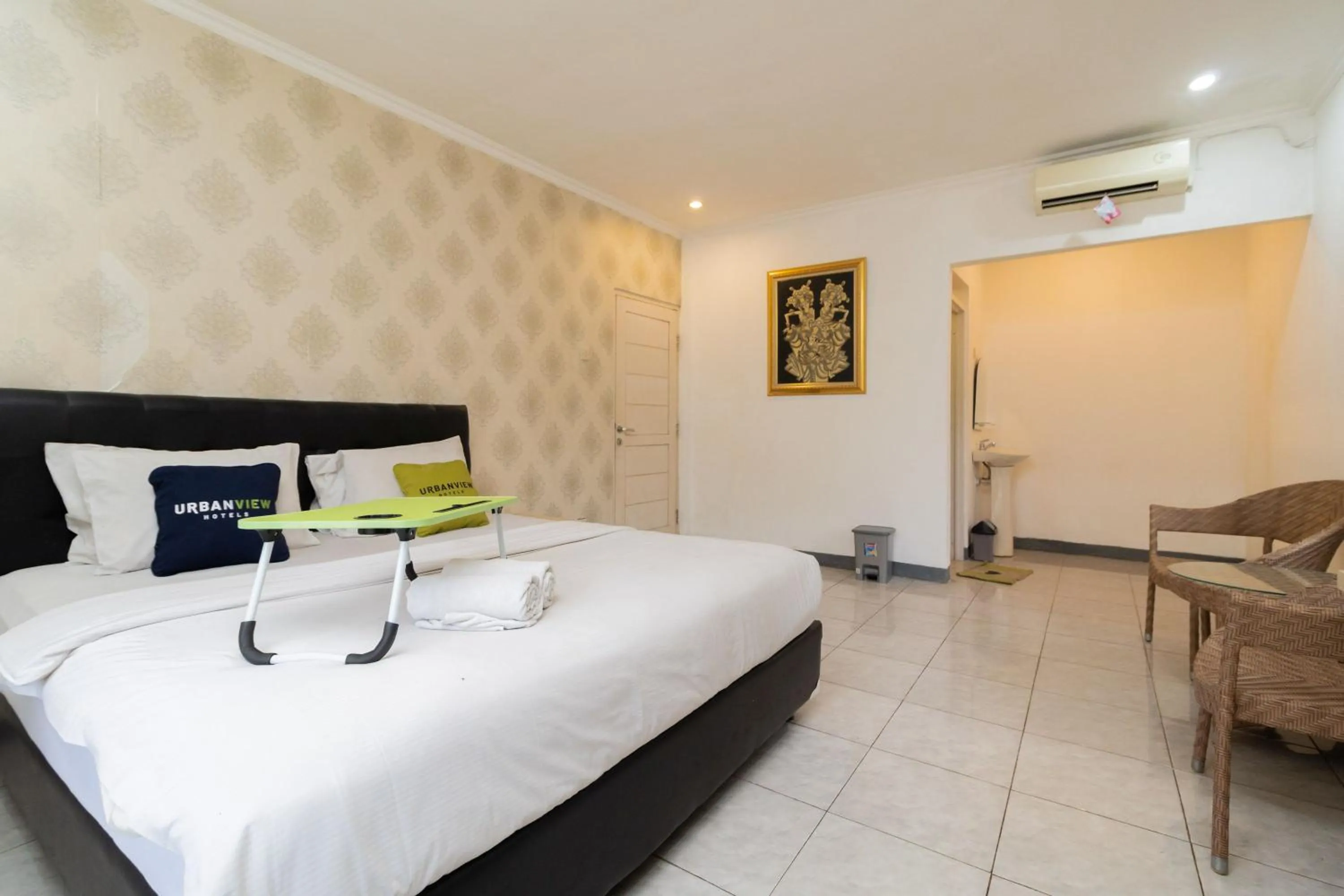 Bedroom, Bed in Urbanview Hotel Gunung Geulis Village by RedDoorz