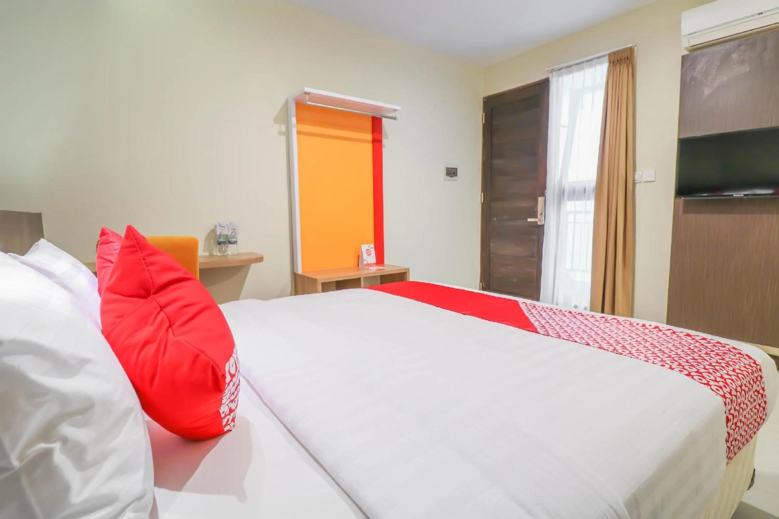 Bedroom in Hotel O Kuta Near Sunset Road Formerly Balitone Residence