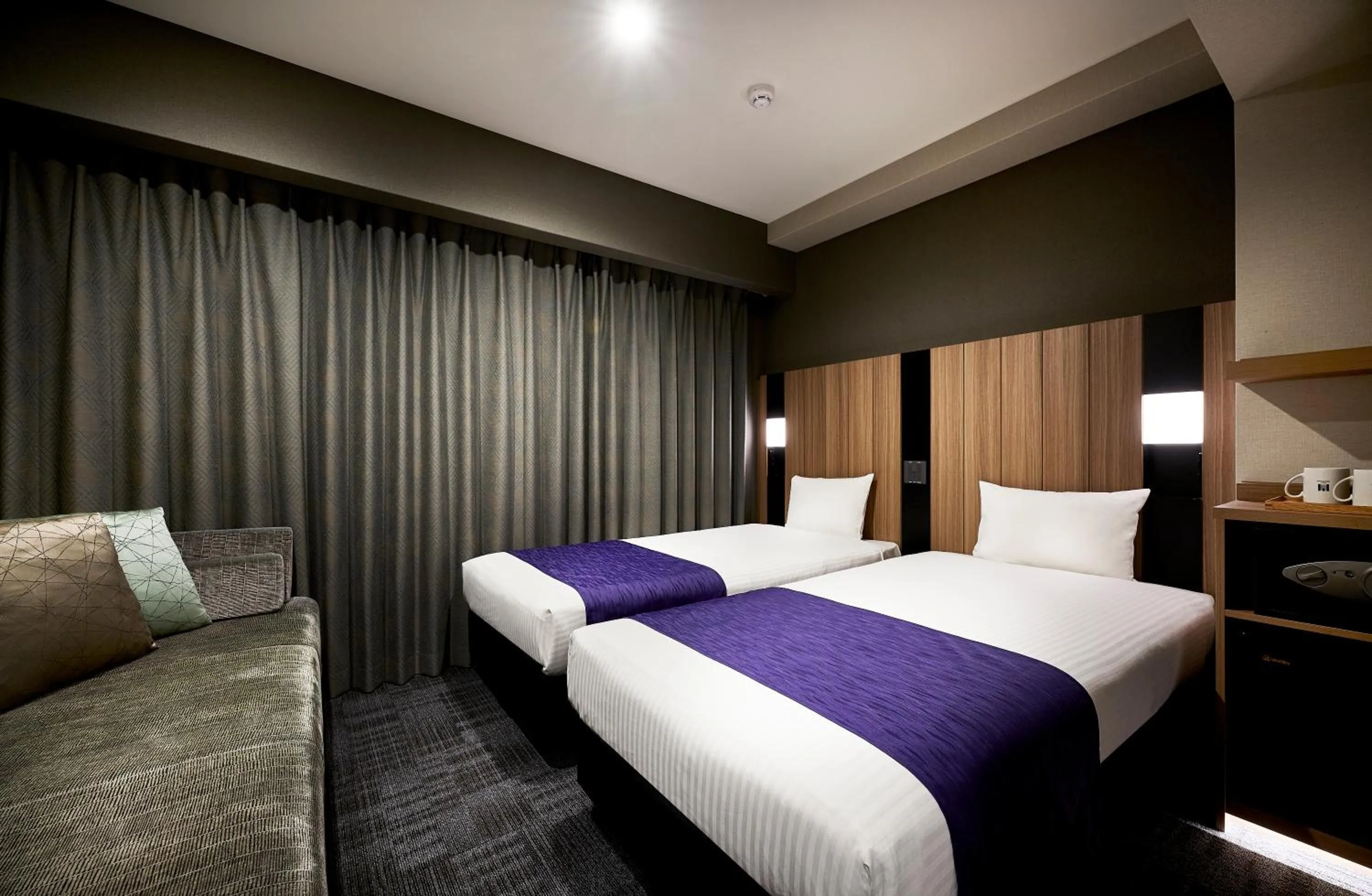 Bed in hotel MONday Kyoto Karasuma Nijo