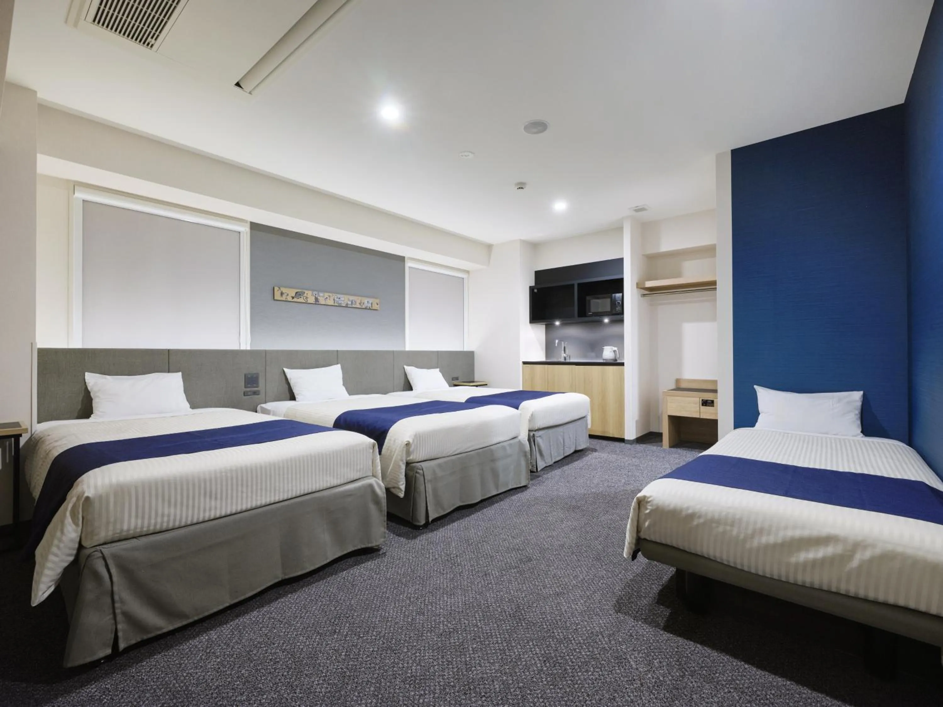 Bed in hotel MONday Premium Ueno Okachimachi