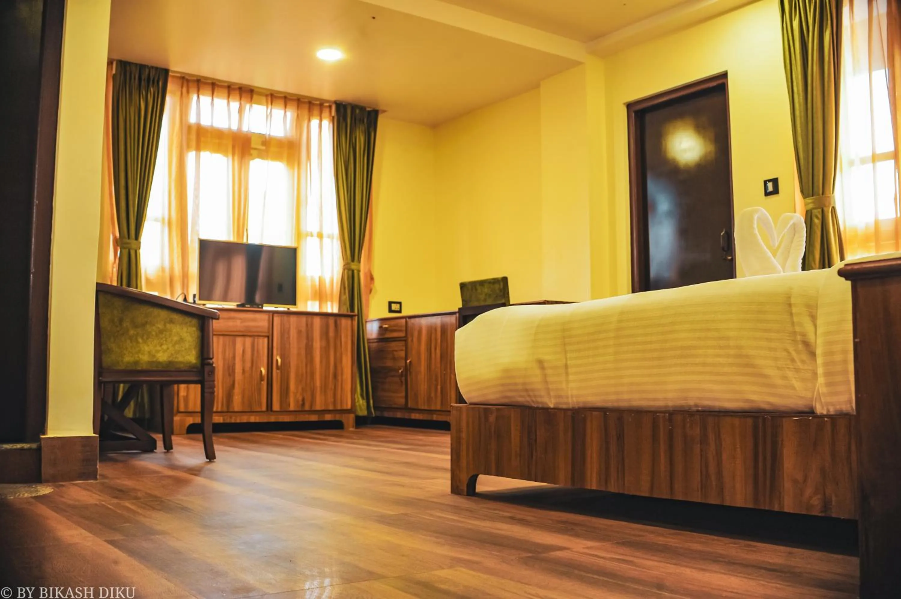 Bed in Golden Kuensel Resort & Spa