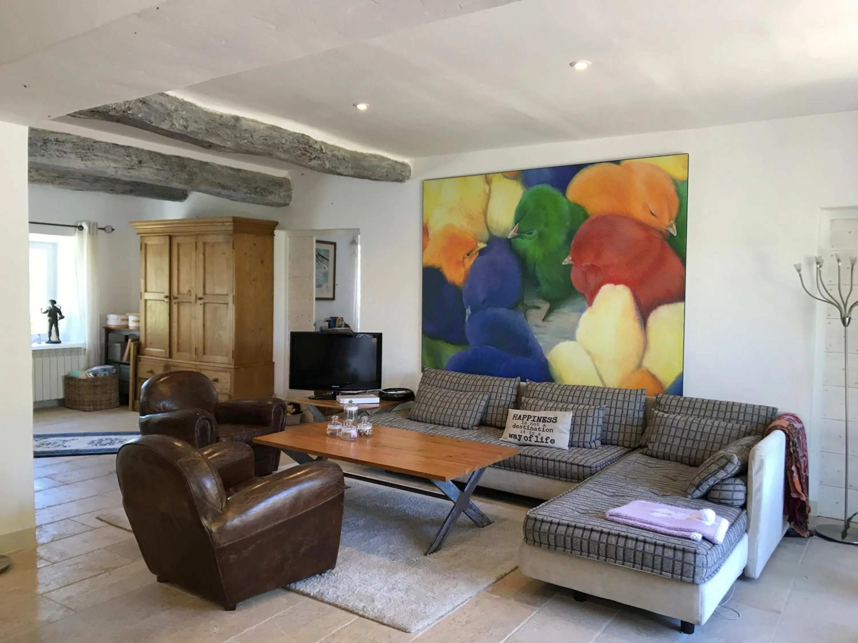 Communal lounge/ TV room in Le Moulin des Sources