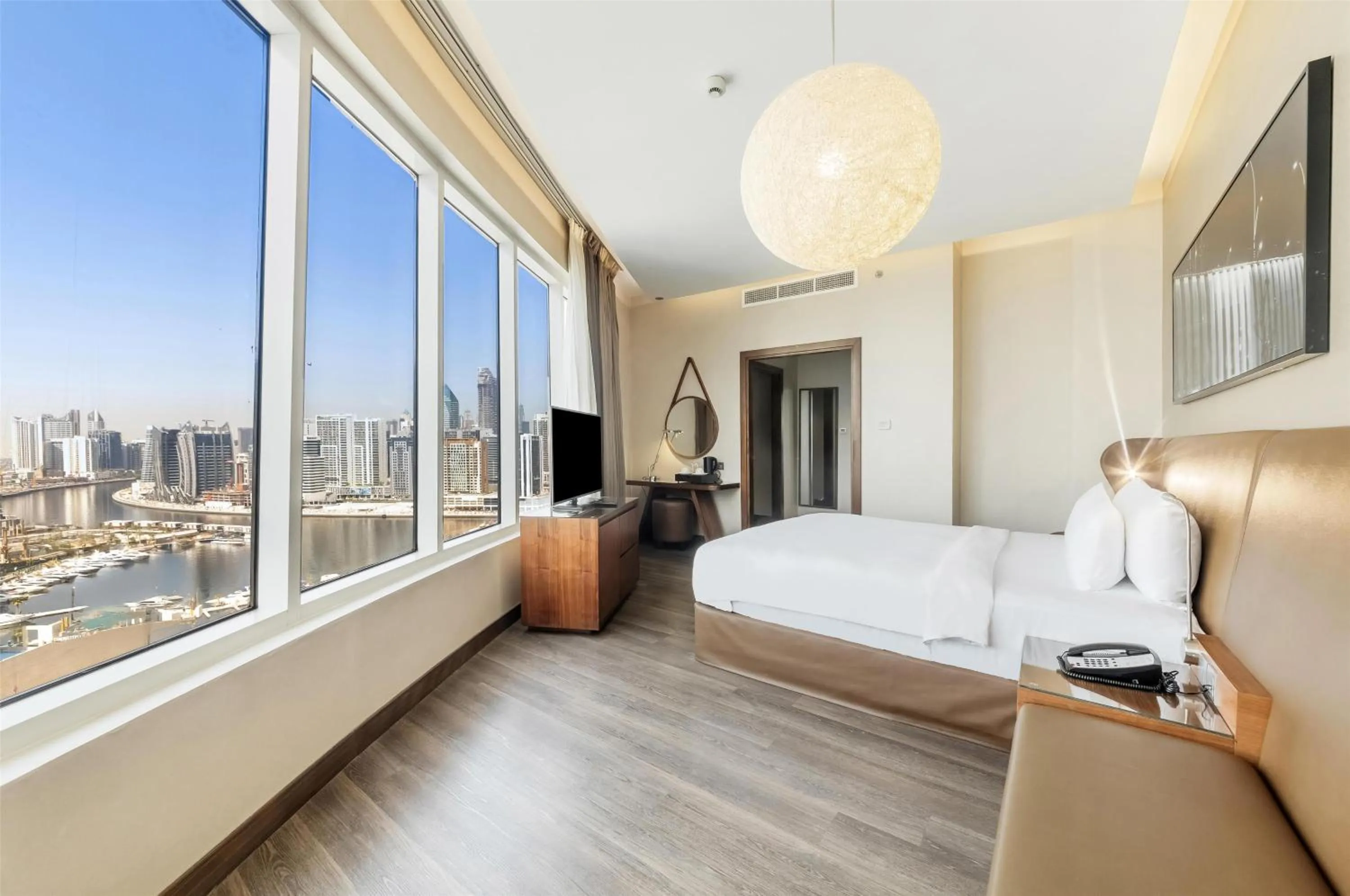 Bedroom, Bed in Radisson Blu Hotel, Dubai Canal View