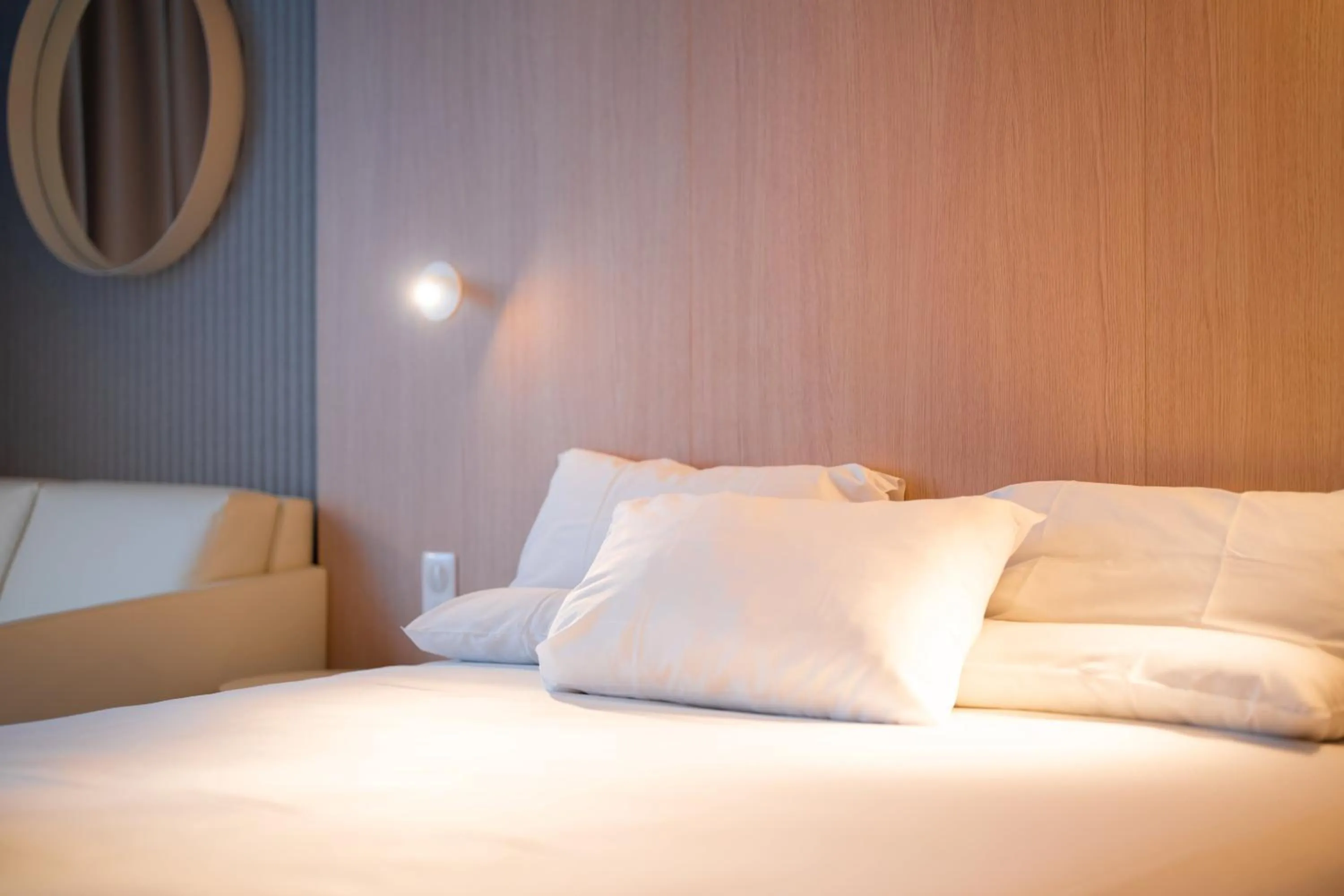 Bed in Novotel Mulhouse Bâle Fribourg