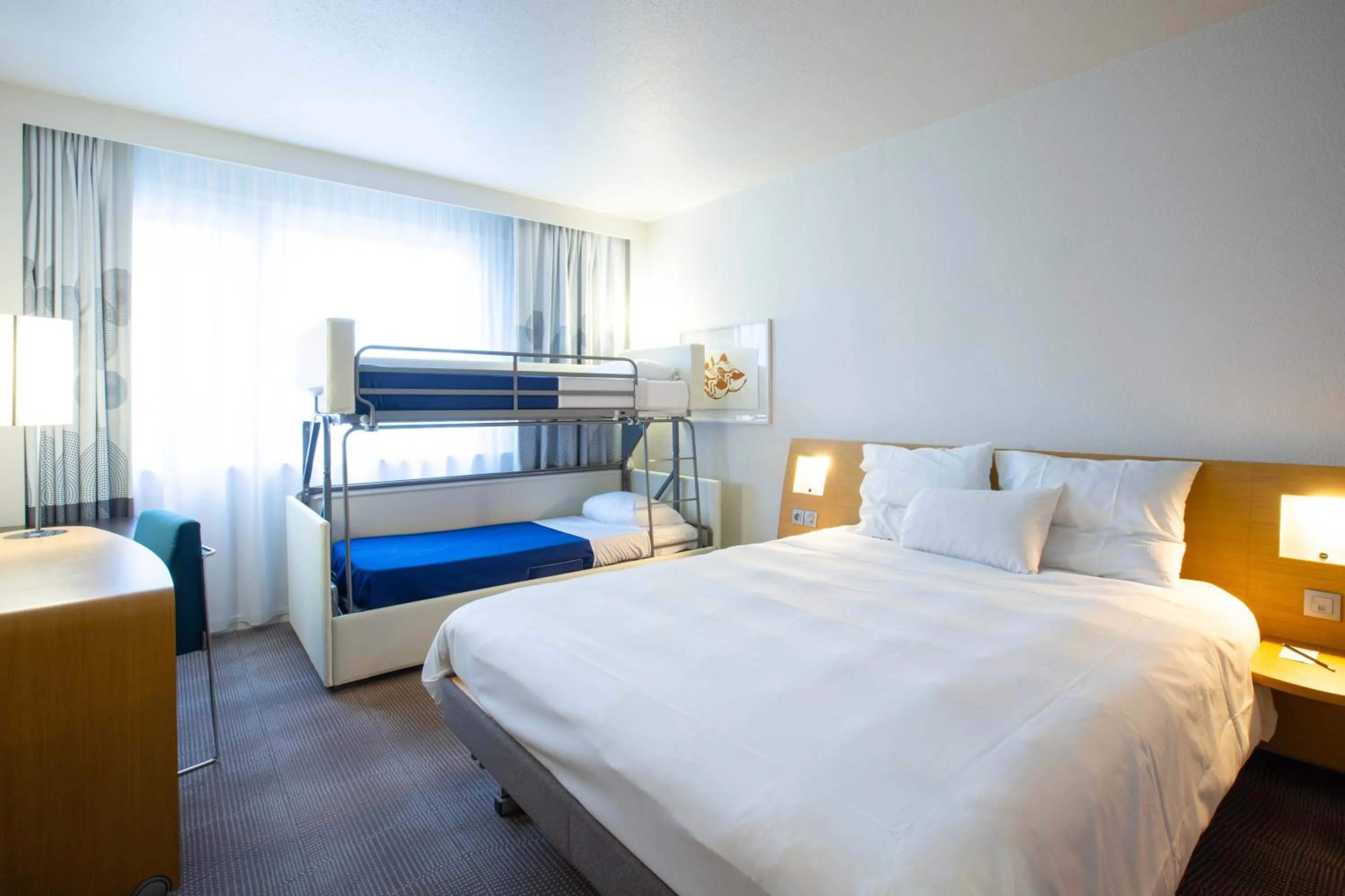 Bed in Novotel Mulhouse Bâle Fribourg