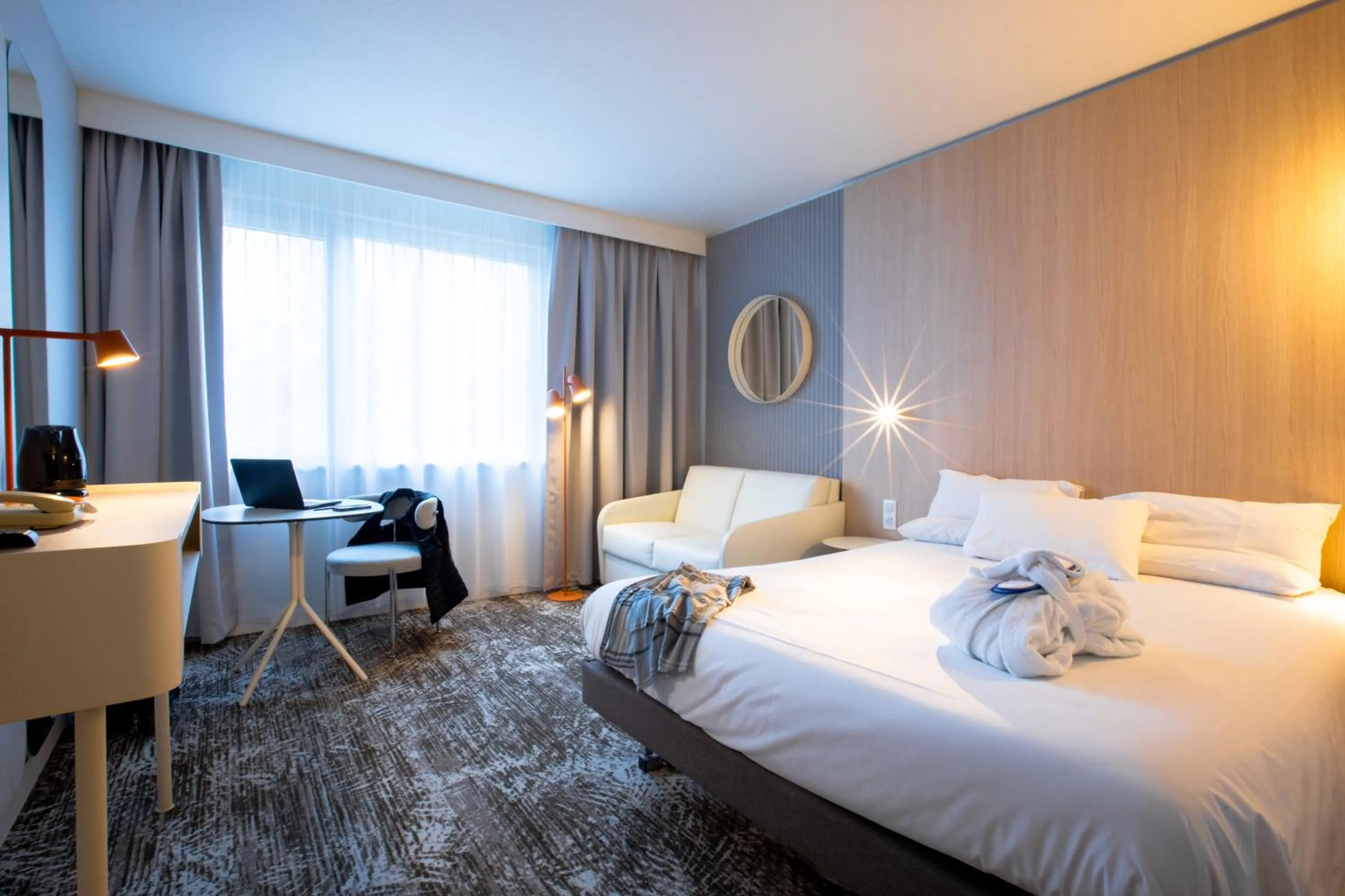 Bed in Novotel Mulhouse Bâle Fribourg