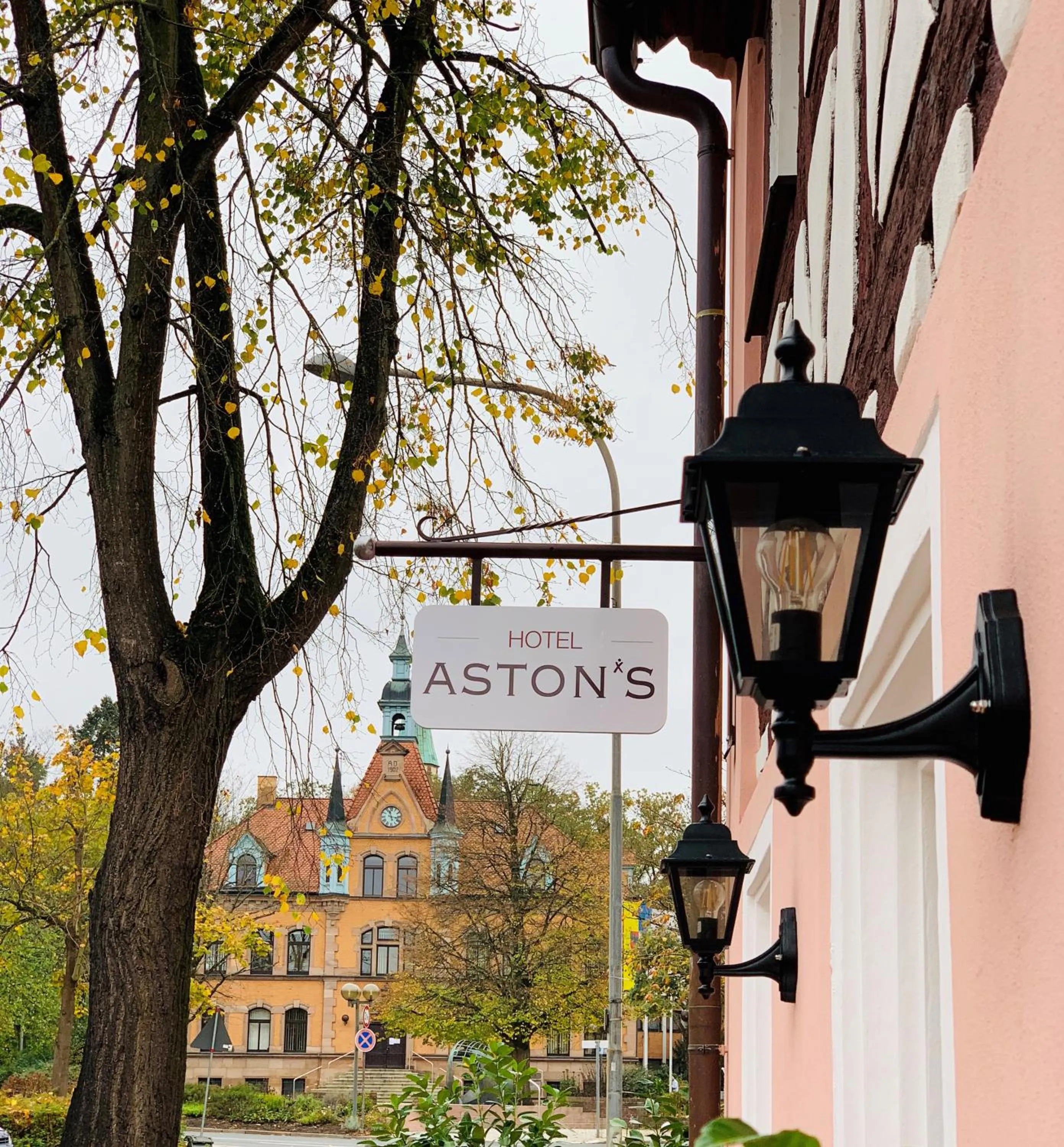 Property logo or sign in Aston‘s Hotel