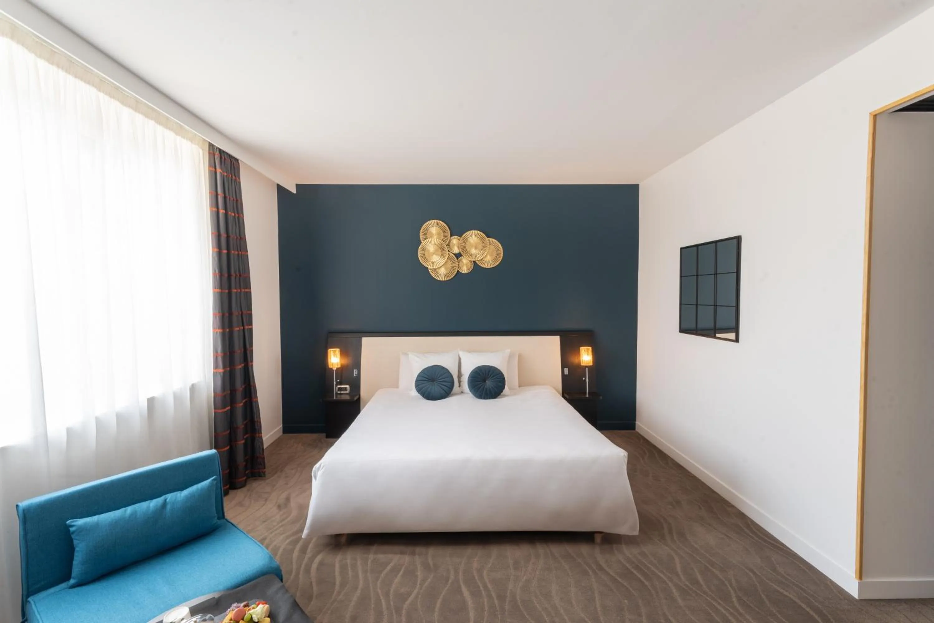 Photo of the whole room, Bed in Mercure Le Mans Centre