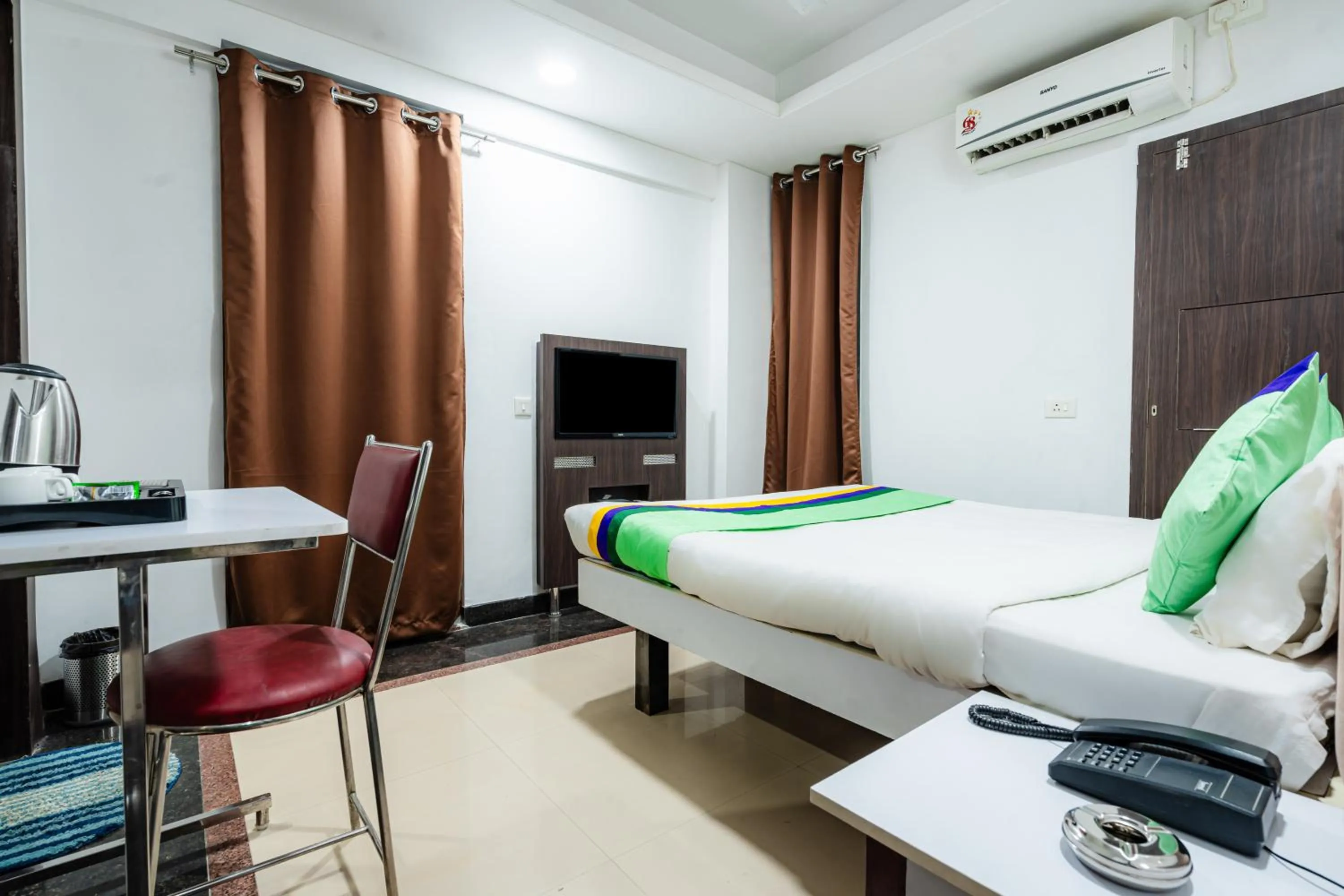 Bedroom, Bed in Treebo Silver Apartment