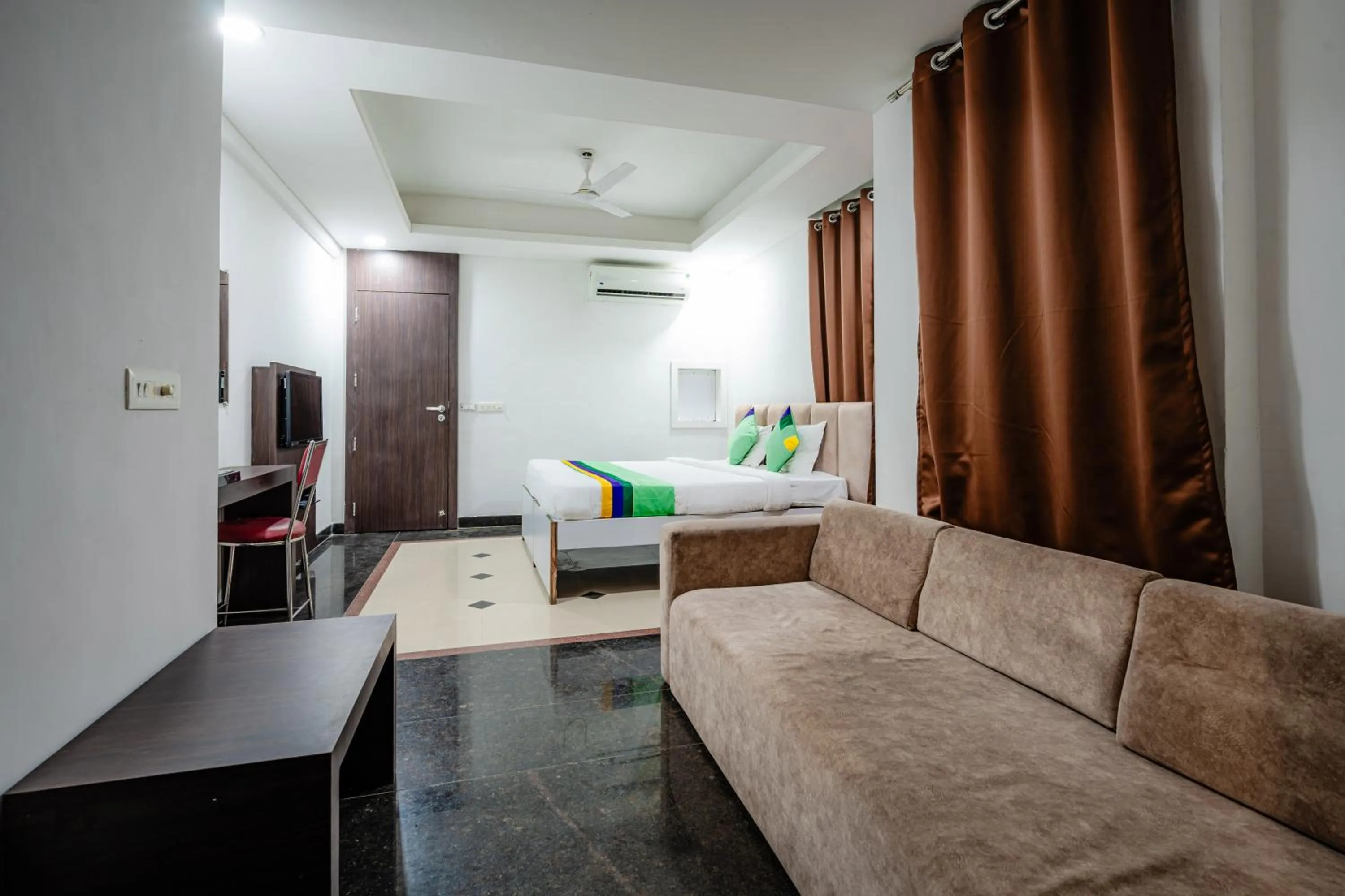 Bedroom, Bed in Treebo Silver Apartment