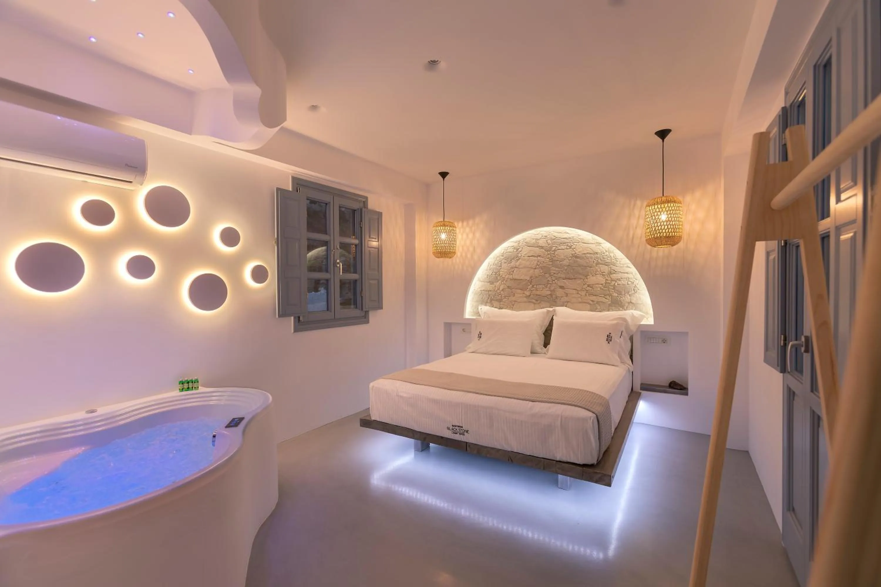 Bed in BlackStone Luxury Suites