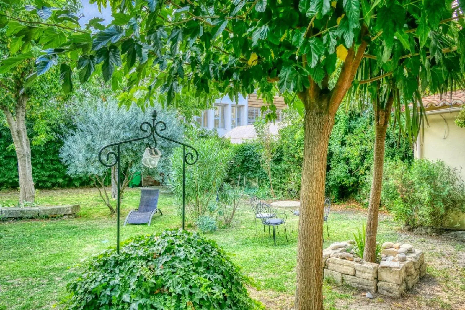 Garden in Au Saint Roch - Hôtel et Jardin