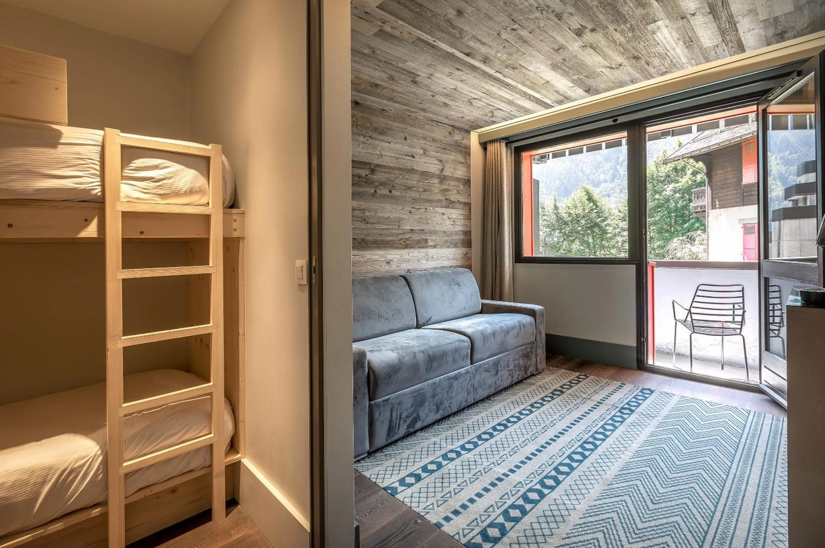 Living room, Bed in Chalet Hôtel Le Prieuré & Spa