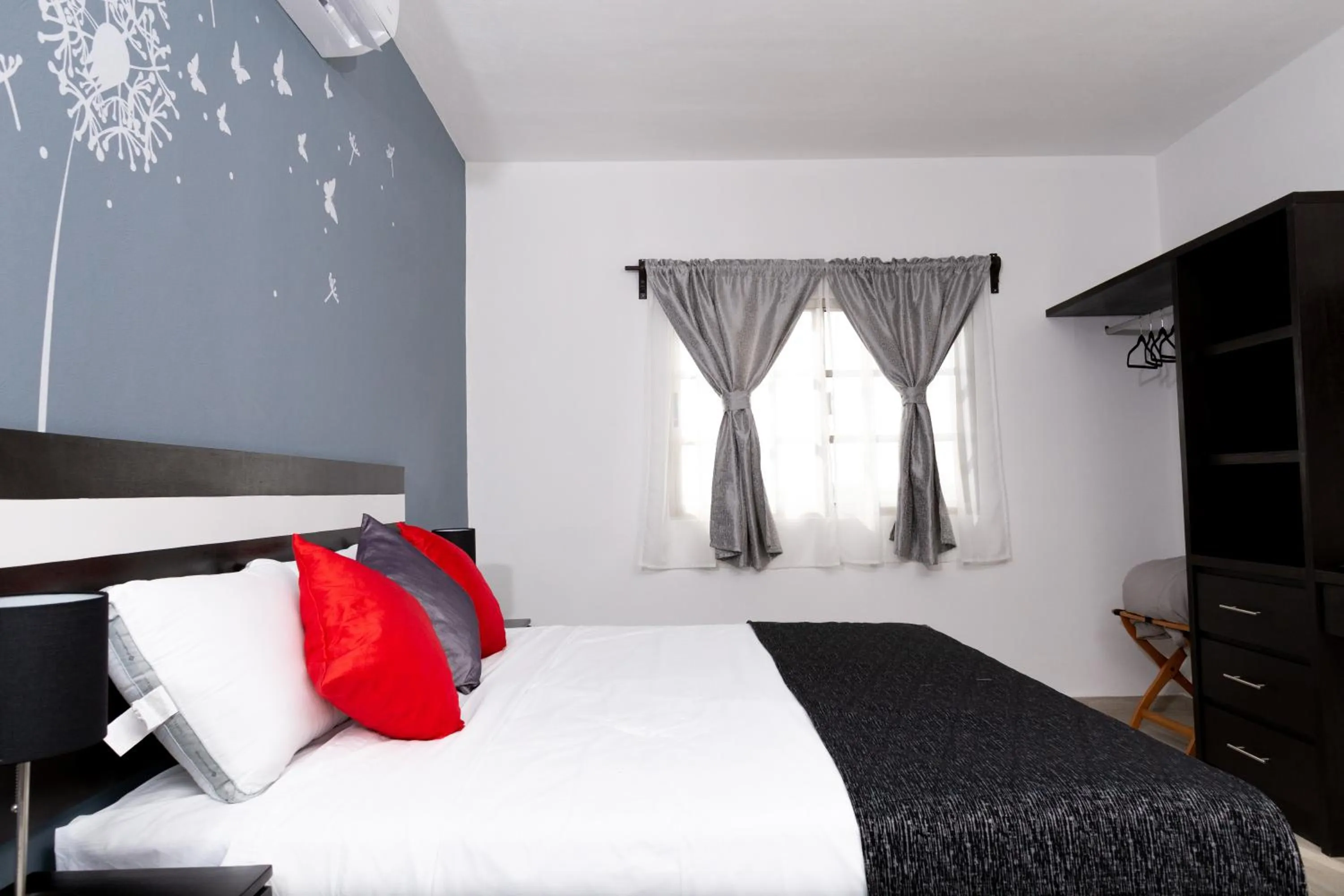 Bed in Santa Fe Studios And Suites