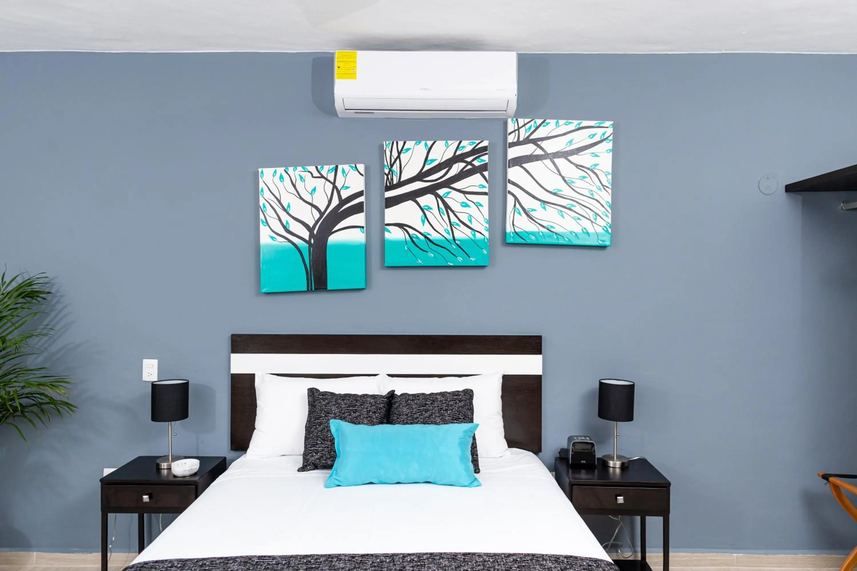 Bed in Santa Fe Studios And Suites