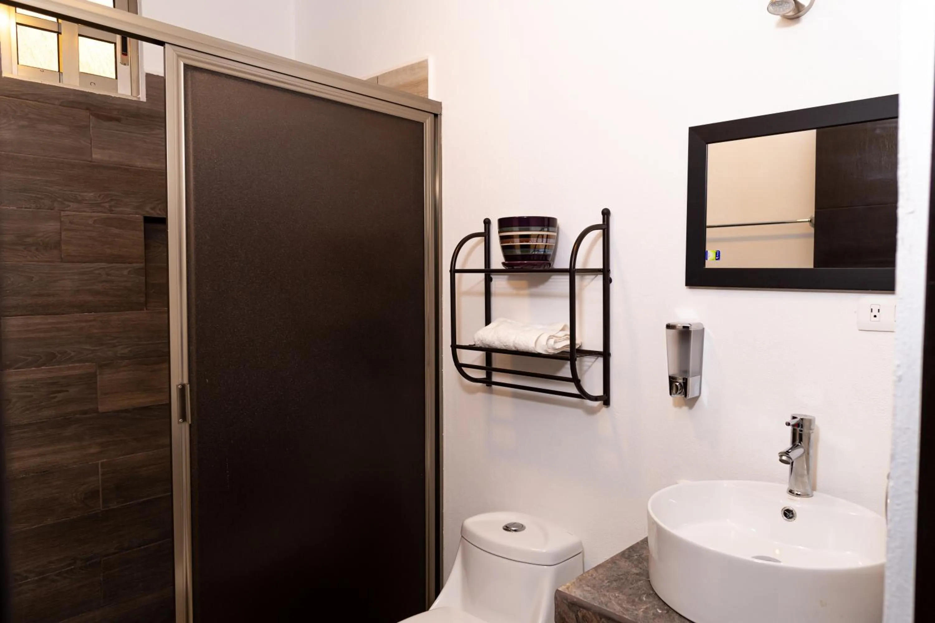 Bathroom in Santa Fe Studios And Suites