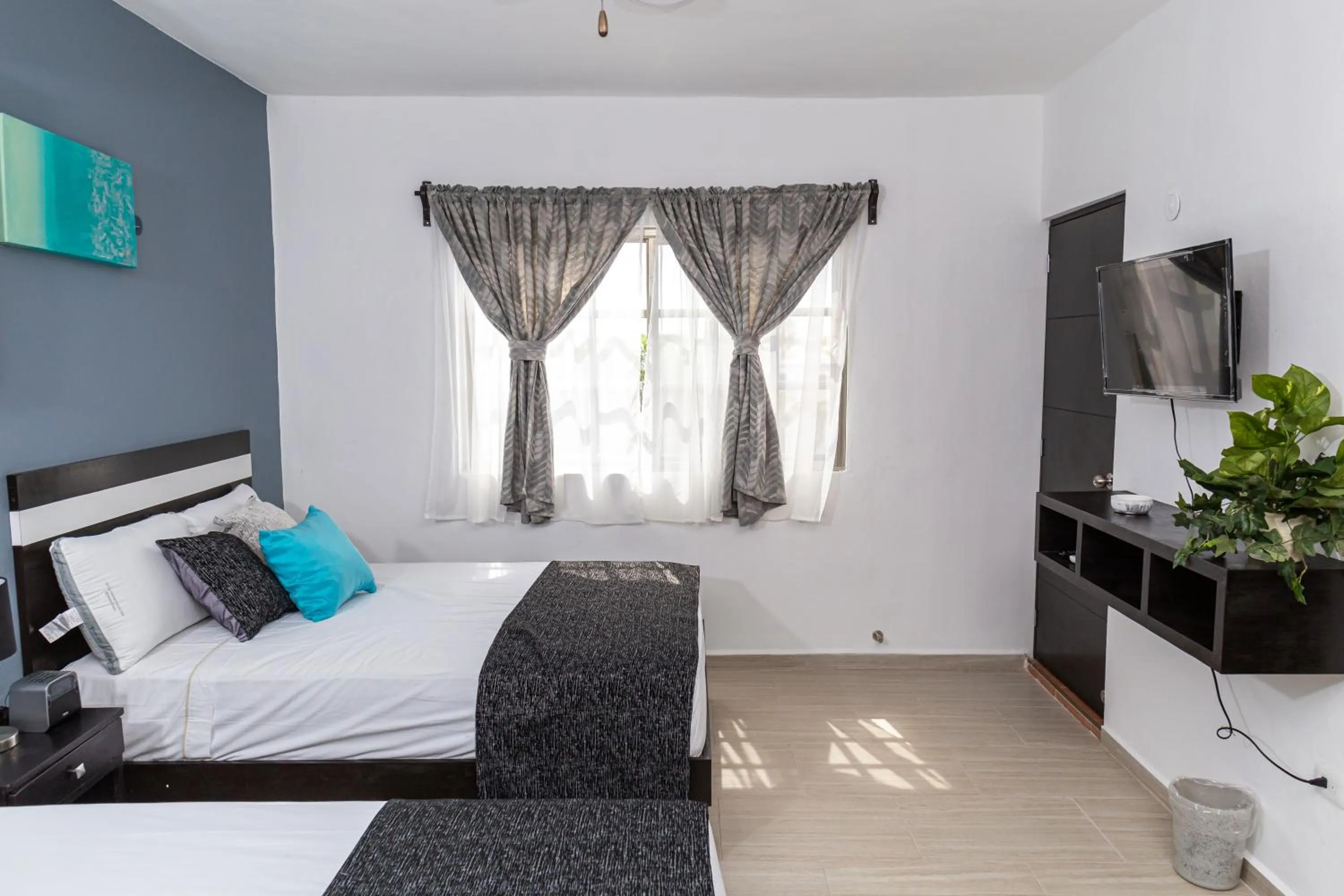 Bed in Santa Fe Studios And Suites