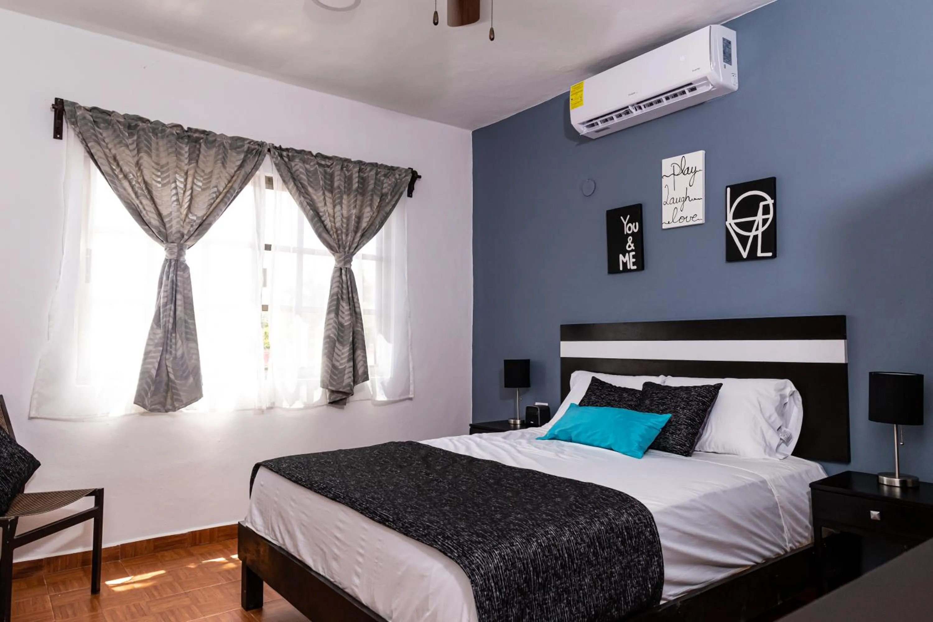 Bed in Santa Fe Studios And Suites