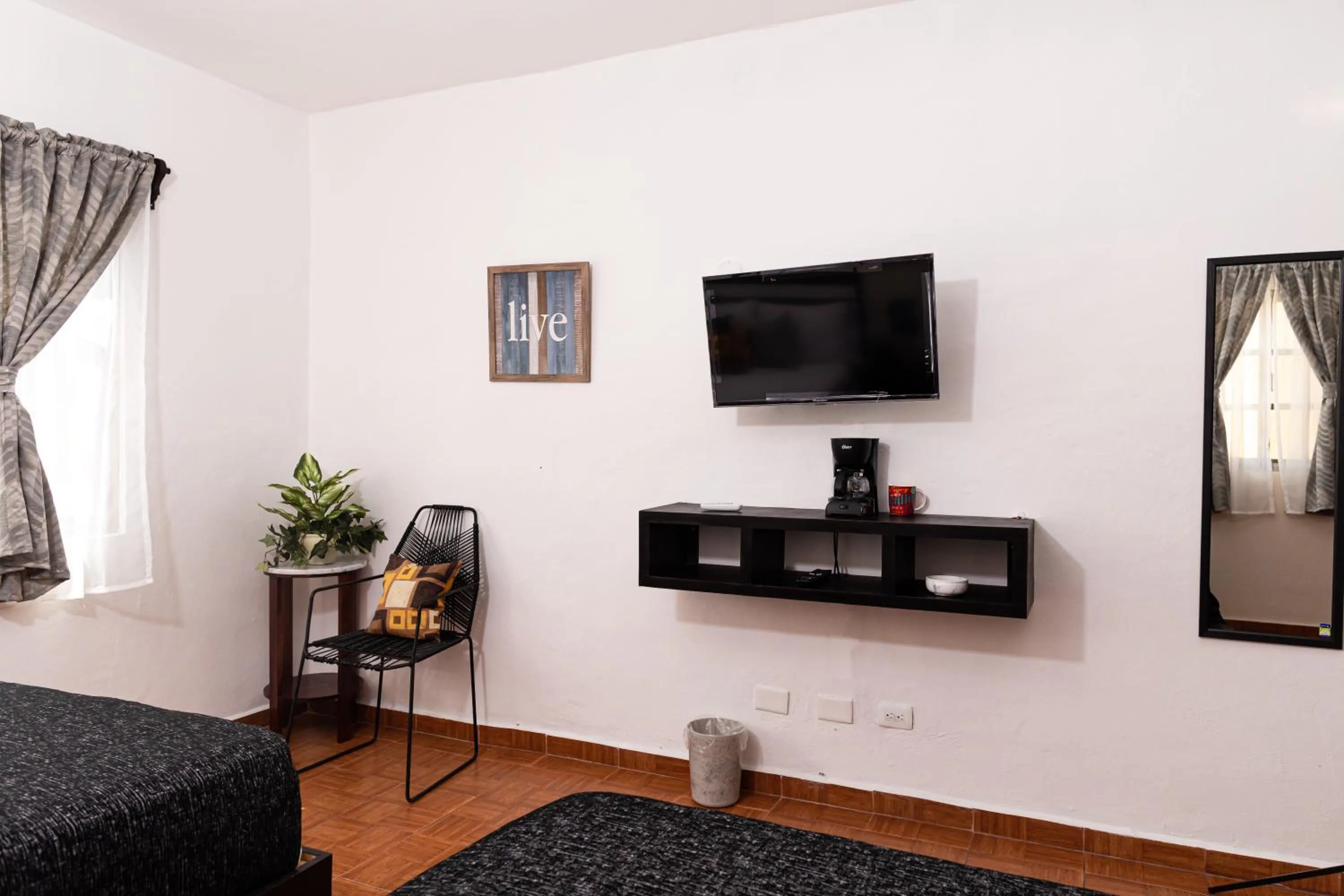 Bed in Santa Fe Studios And Suites