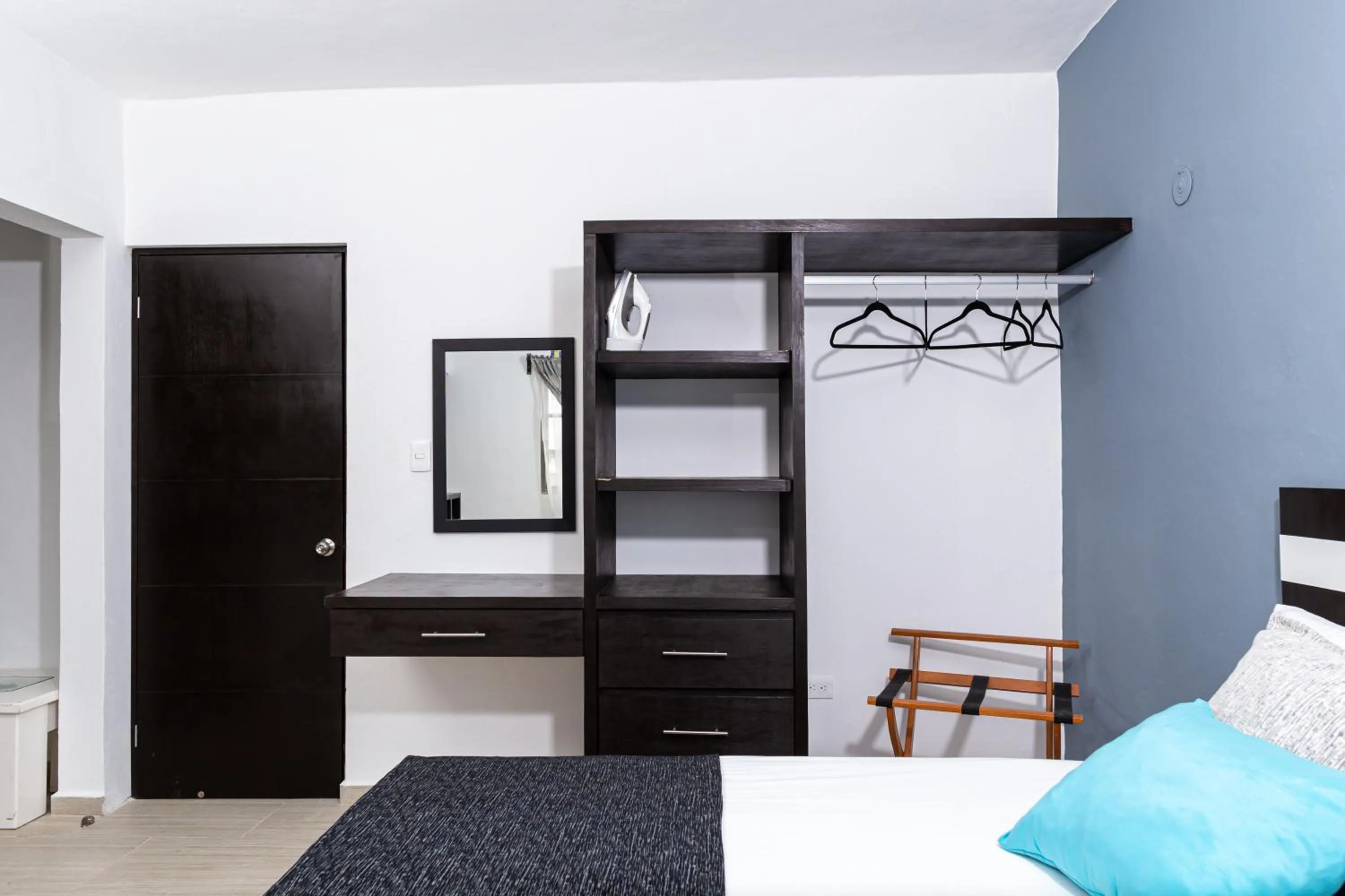 Bed in Santa Fe Studios And Suites