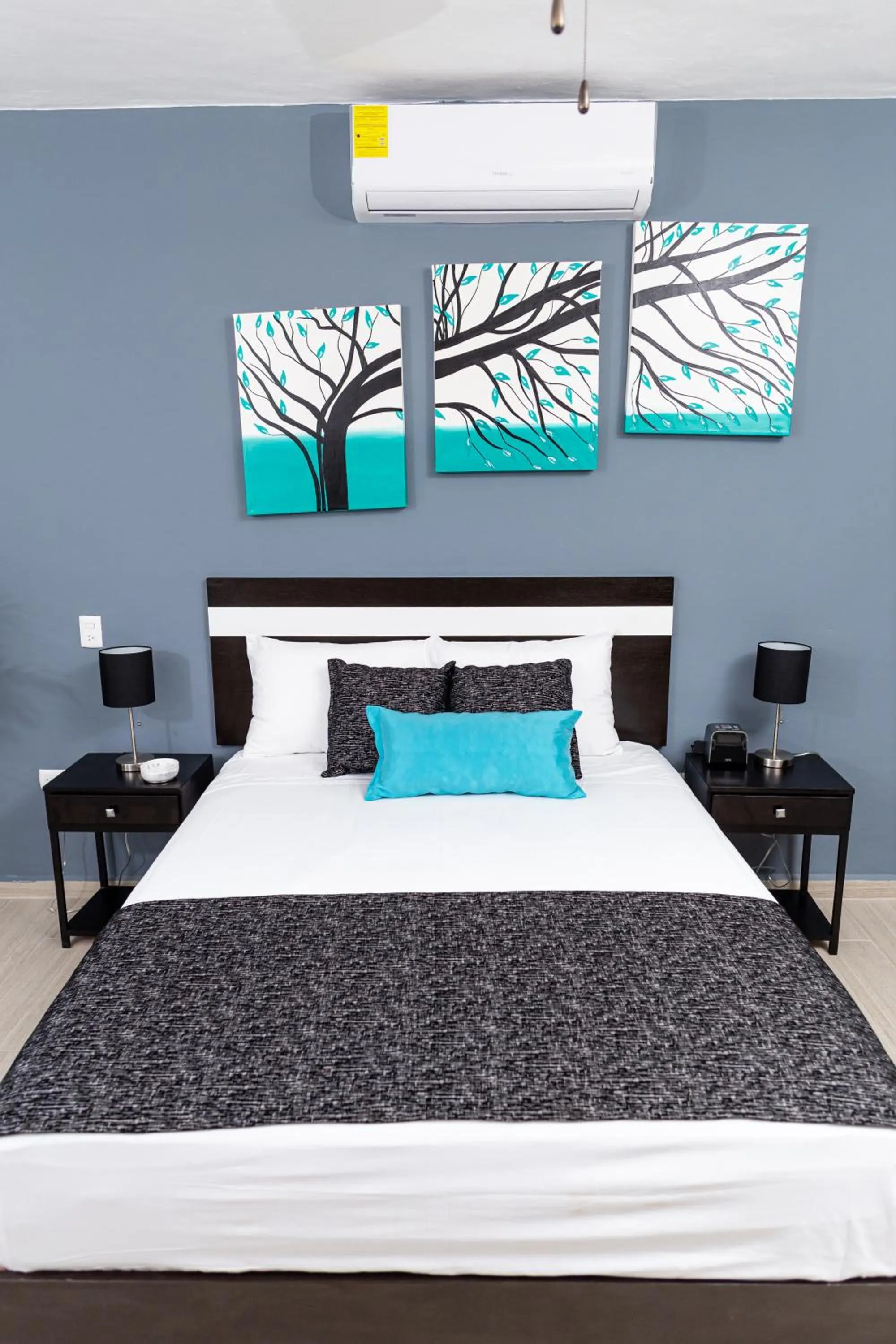 Bed in Santa Fe Studios And Suites