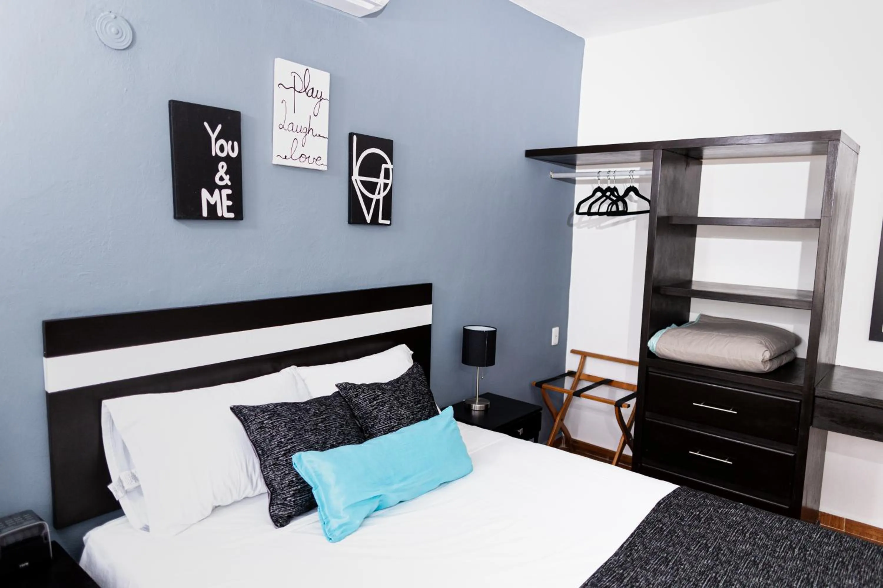 Bed in Santa Fe Studios And Suites