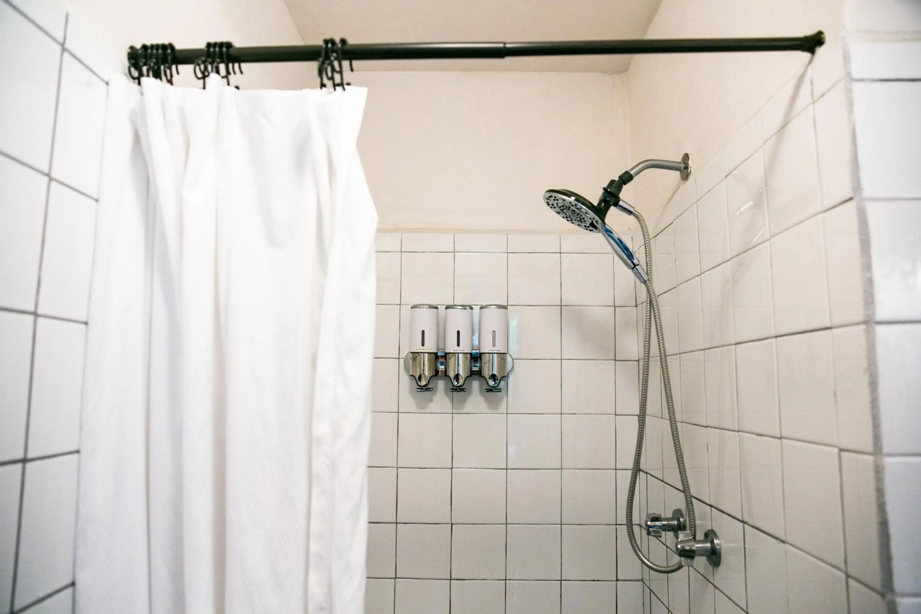 Shower in Numero Uno Beach Apartments