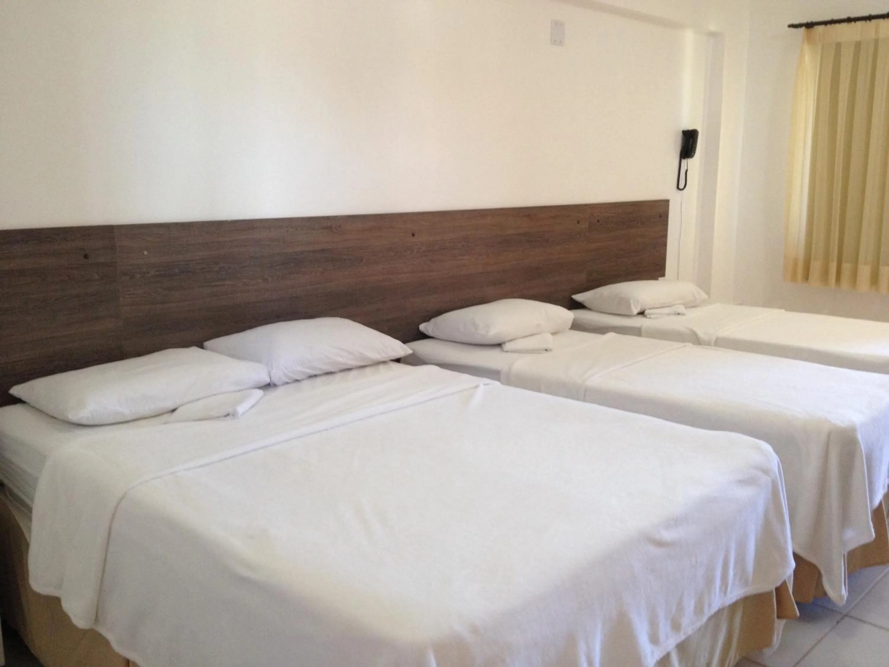 Bed in Pousada Porto das Dunas