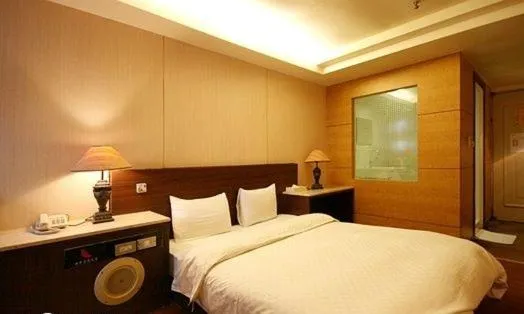 Bed in Zaw Jung Business Hotel