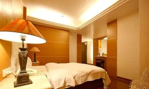 Bed in Zaw Jung Business Hotel