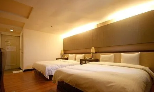 Bed in Zaw Jung Business Hotel