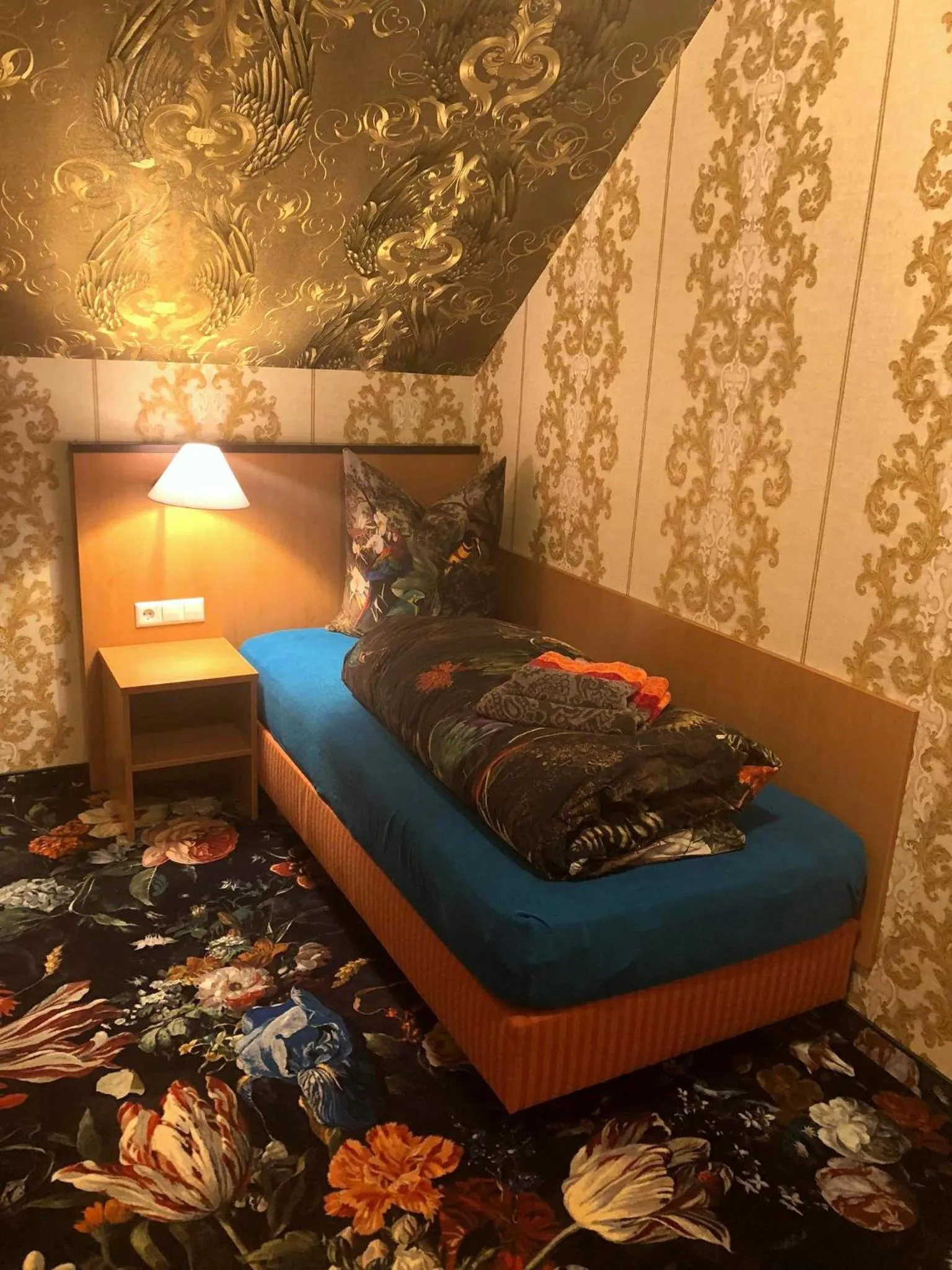 Bed in Hotel Eulenspiegel - Das Erlebnishotel in Riesa