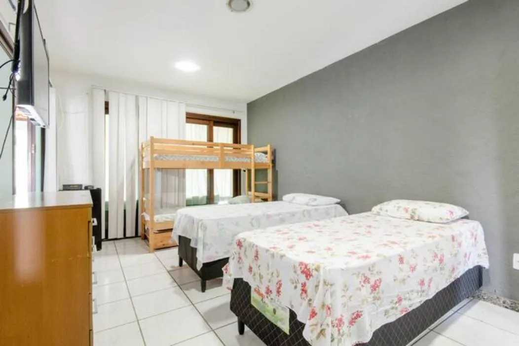 Bed in Pousada Queiroz