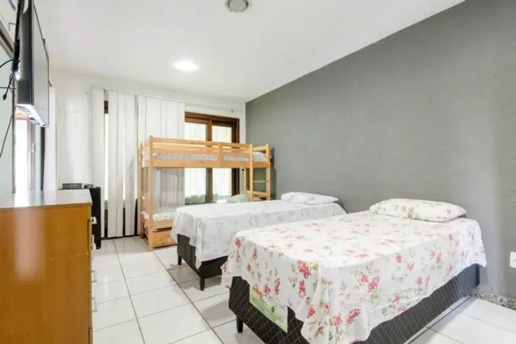 Economy Triple Room with Shared Bathroom - single occupancy in Pousada Queiroz Economy Triple Room with Shared Bathroom - single occupancy in Pousada Queiroz