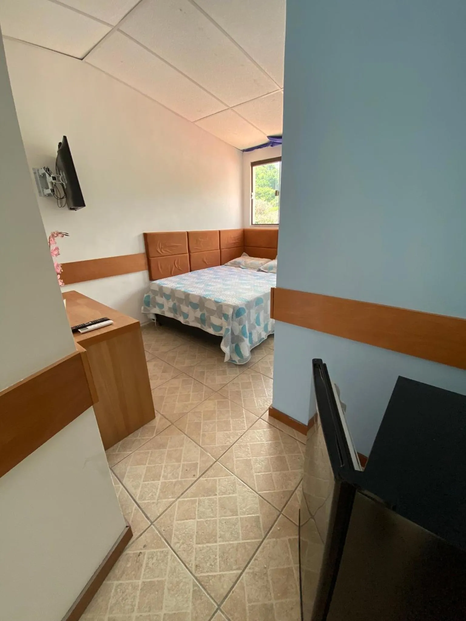 Bed in Pousada Queiroz