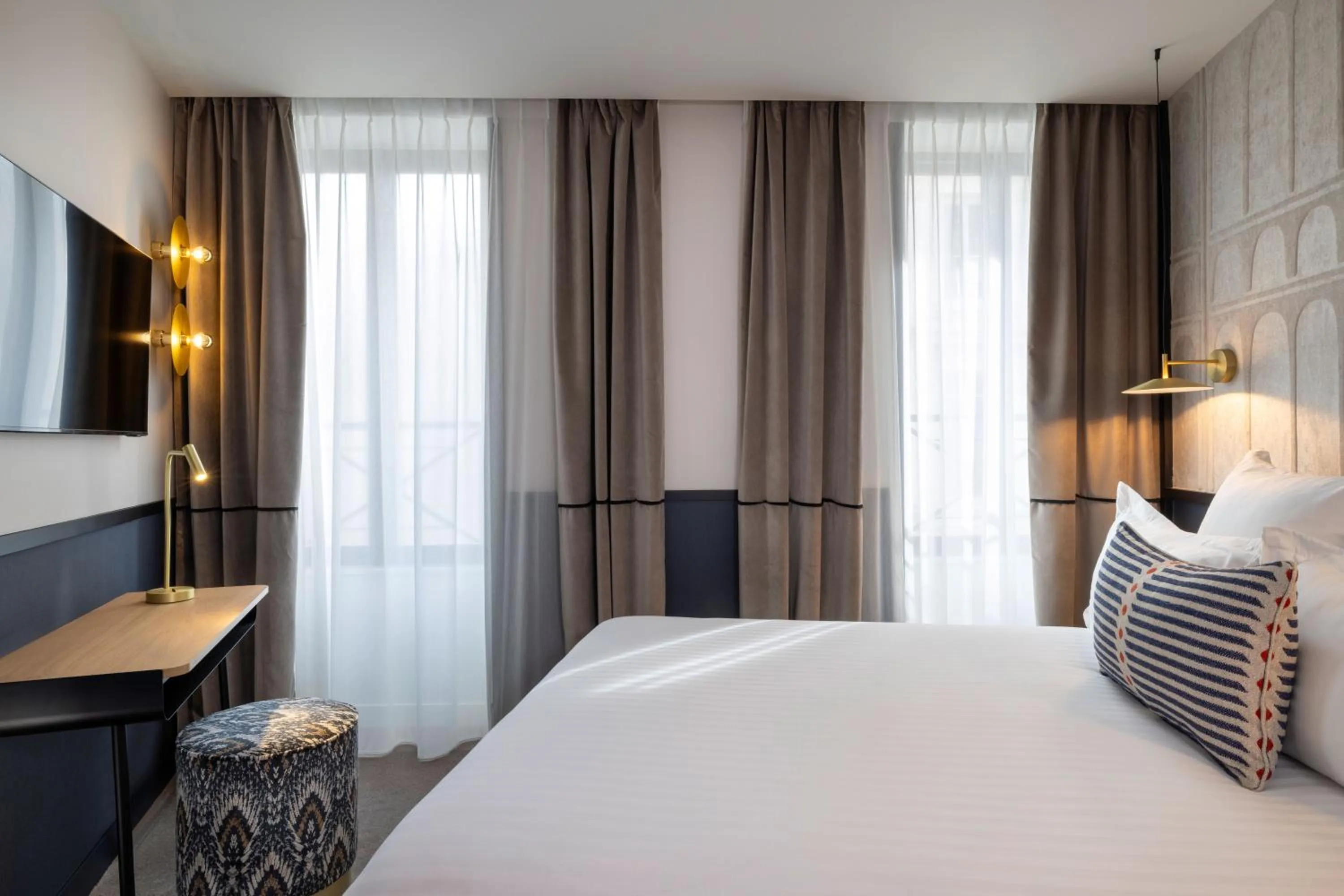 Photo of the whole room, Bed in Hotel Grand Coeur Latin