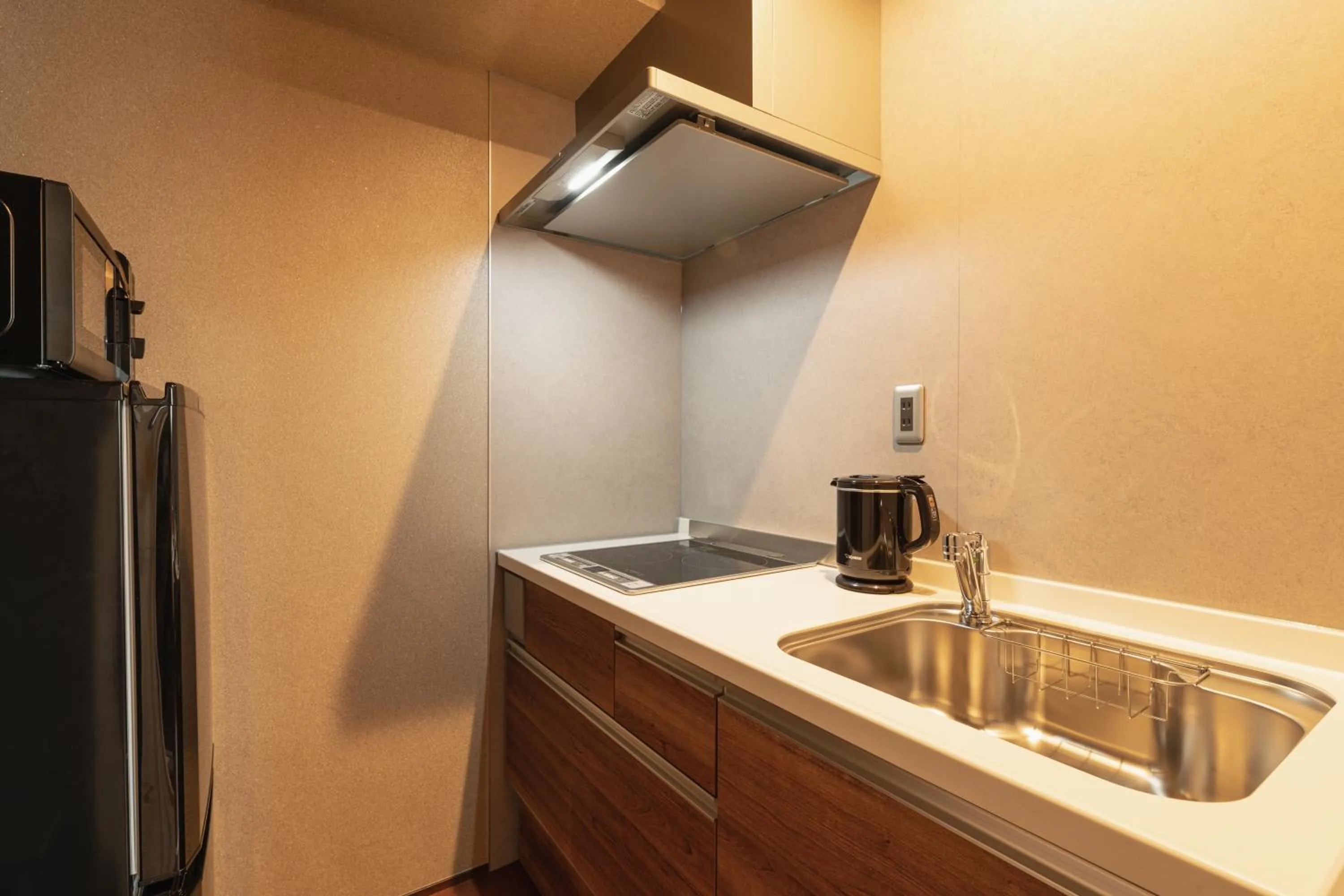 Kitchen or kitchenette in GRAND BASE Beppu