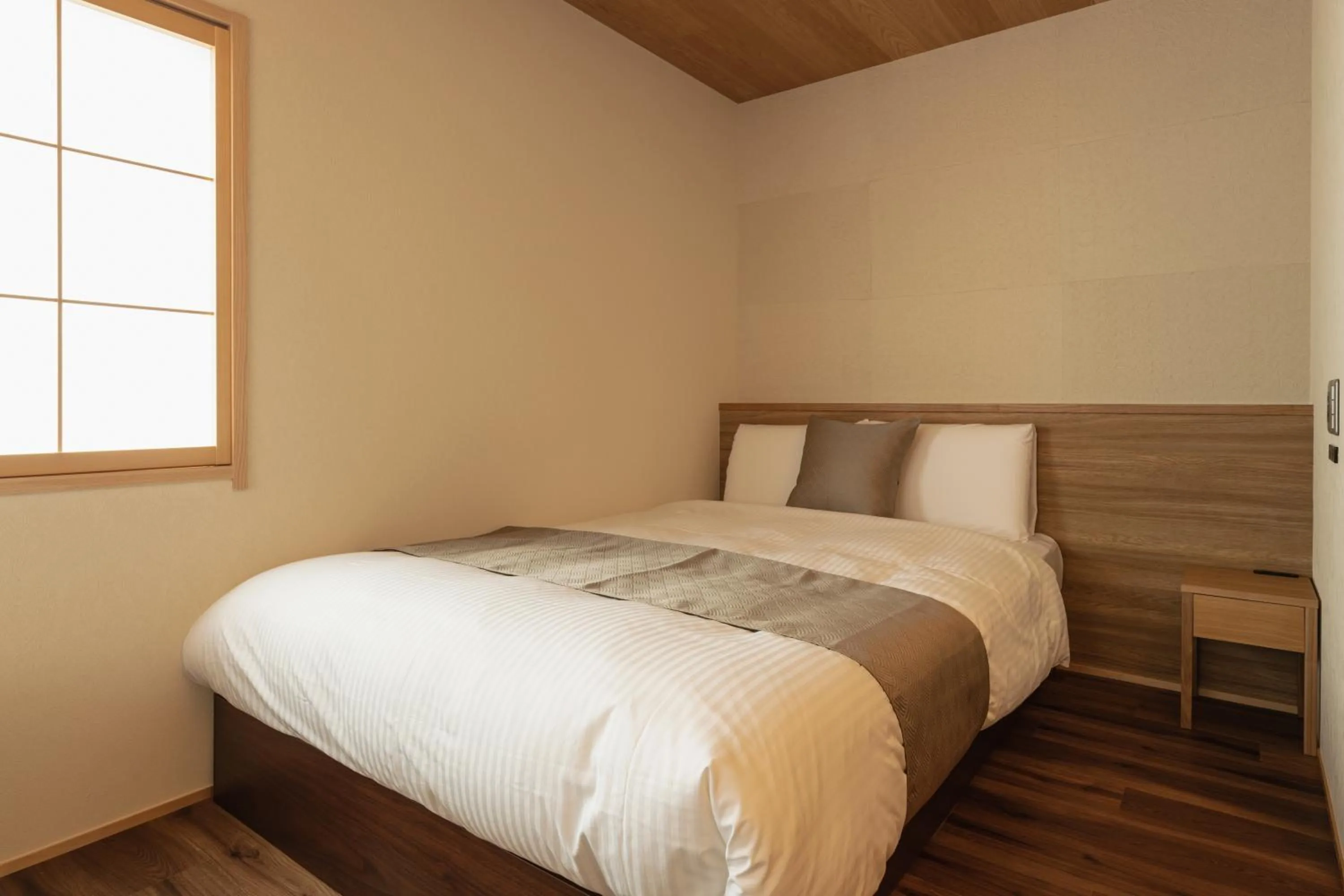 Bed in GRAND BASE Beppu