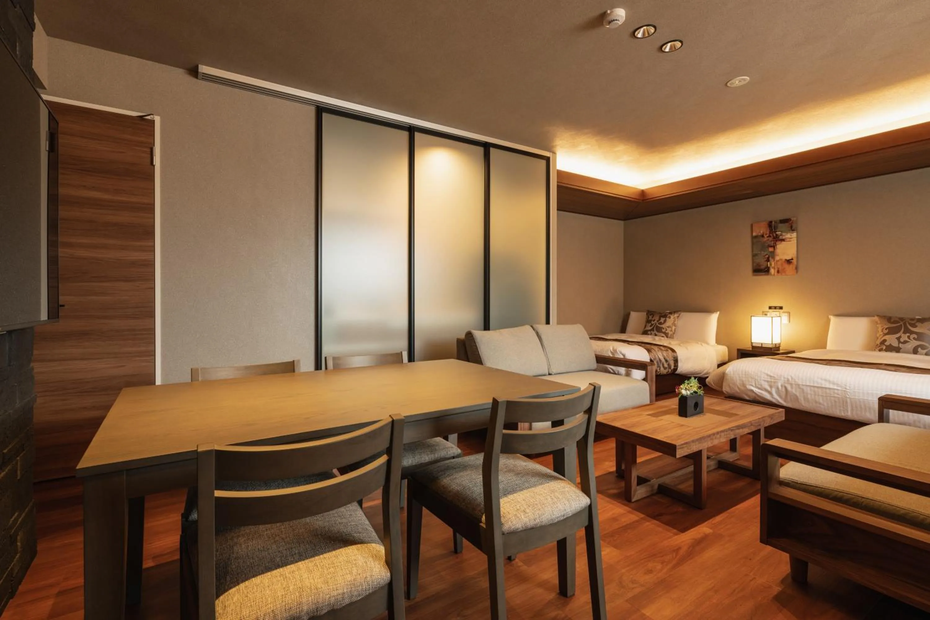 Living room, Bed in GRAND BASE Beppu