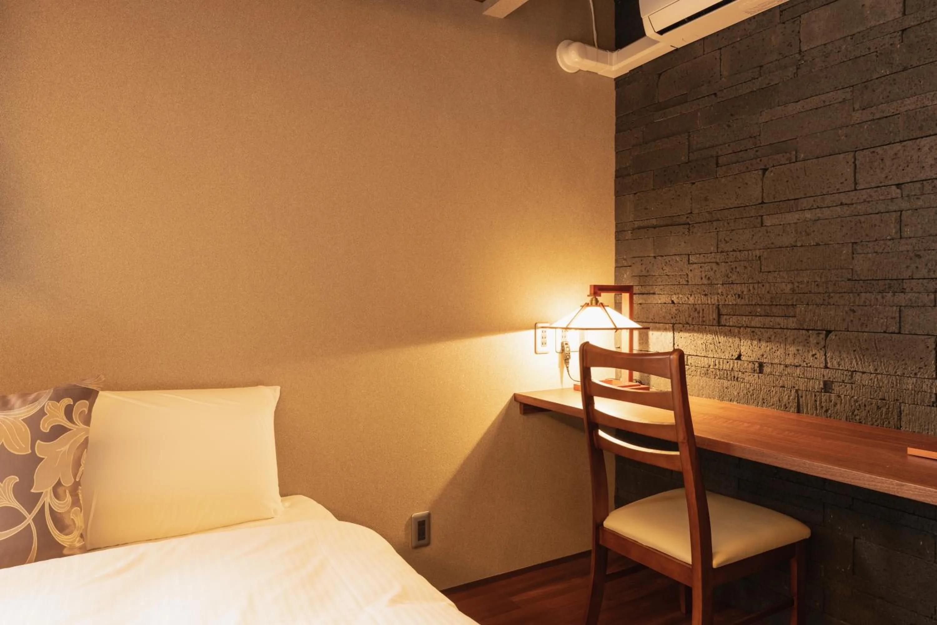 Photo of the whole room, Bed in GRAND BASE Beppu