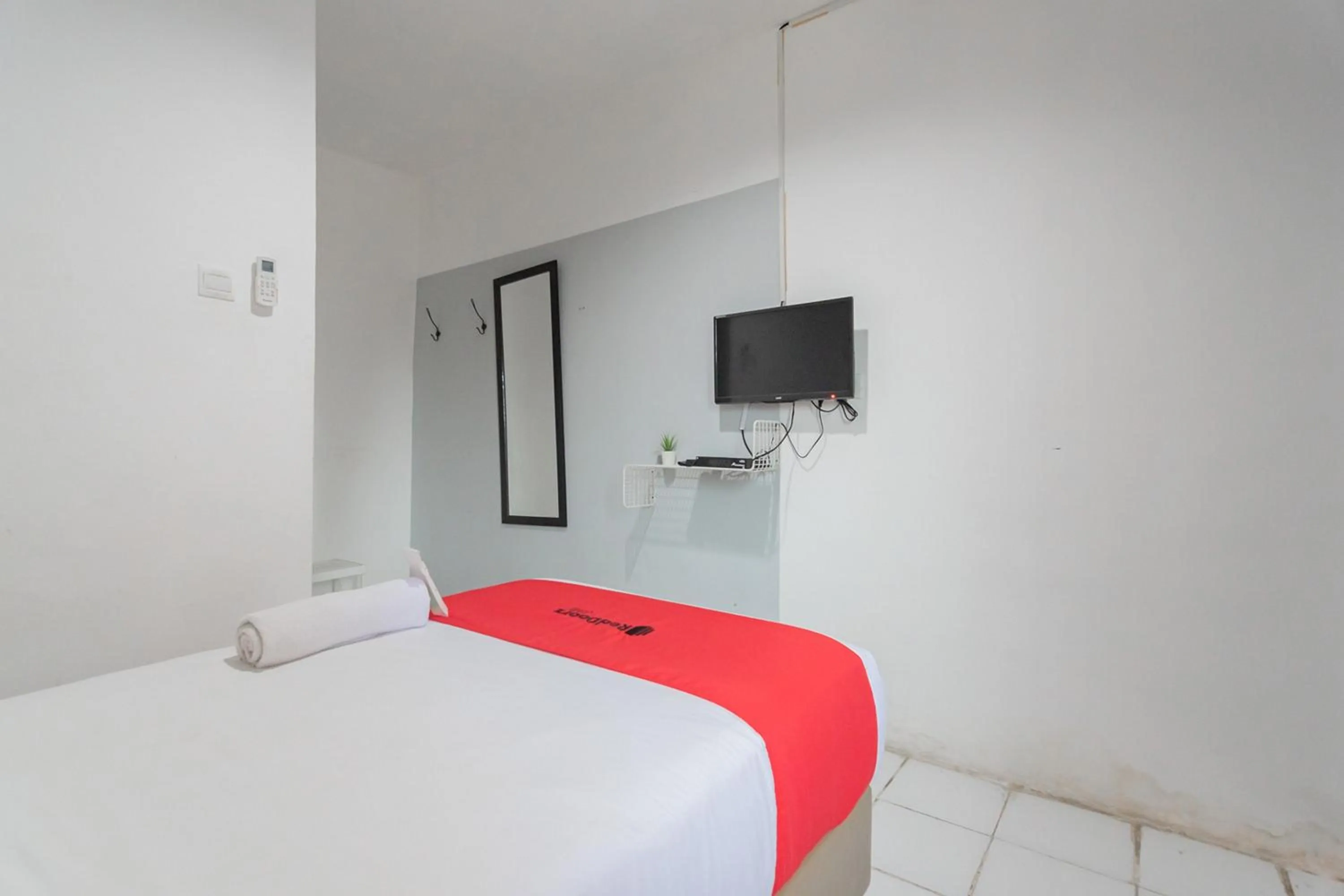 Bed in RedDoorz At Sani Guest House Balikpapan