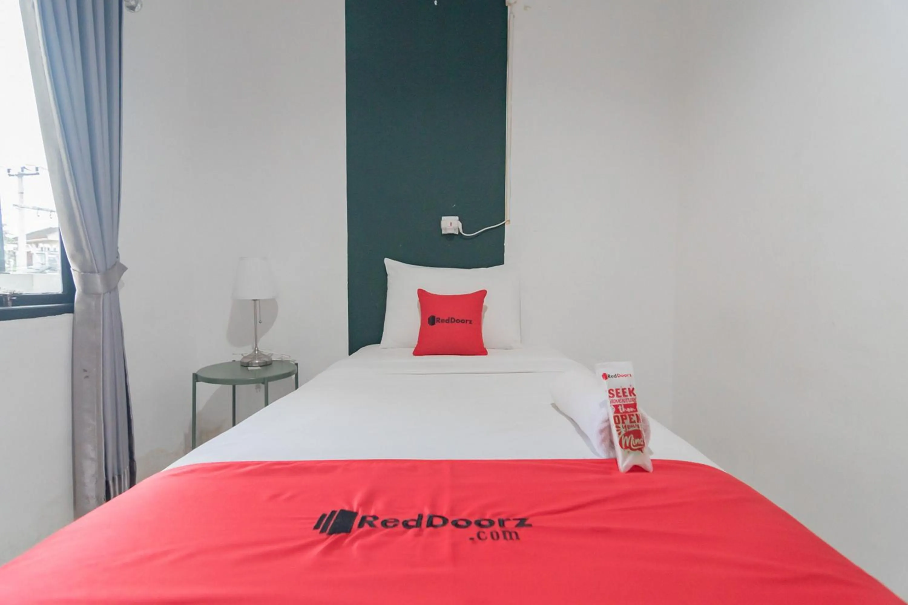 Bed in RedDoorz At Sani Guest House Balikpapan