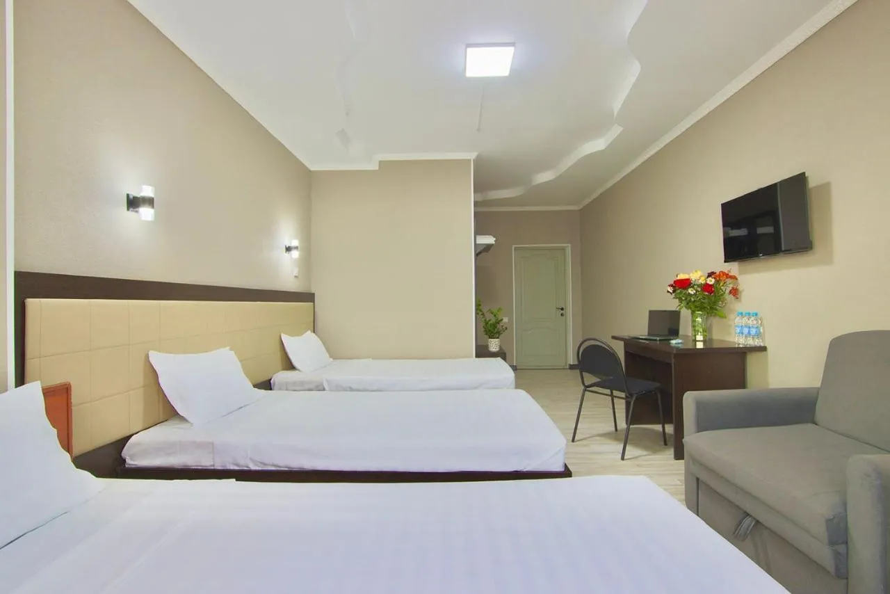 Living room, Bed in Altamira Hotel