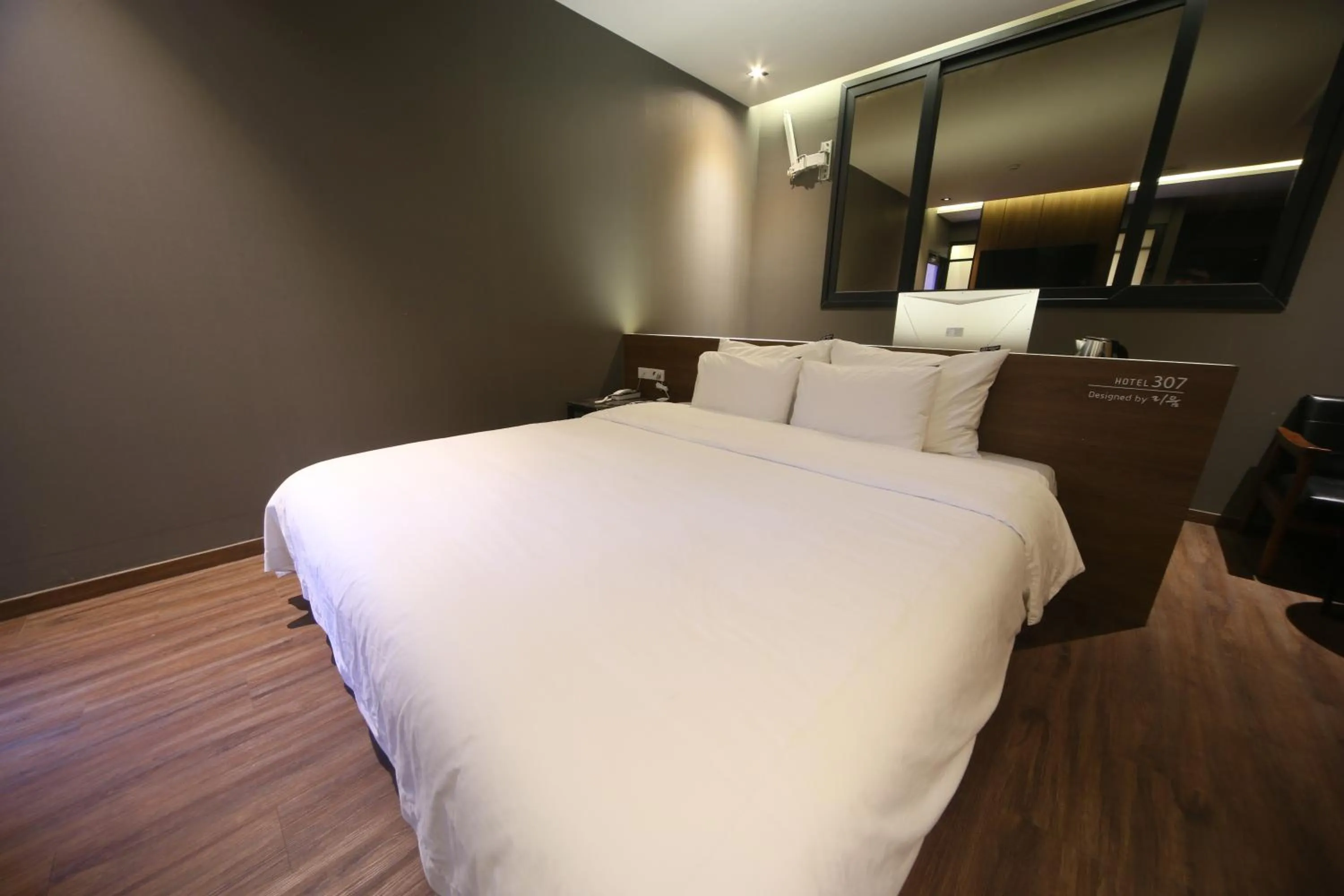 Bed in Beomil Brown Dot Hotel